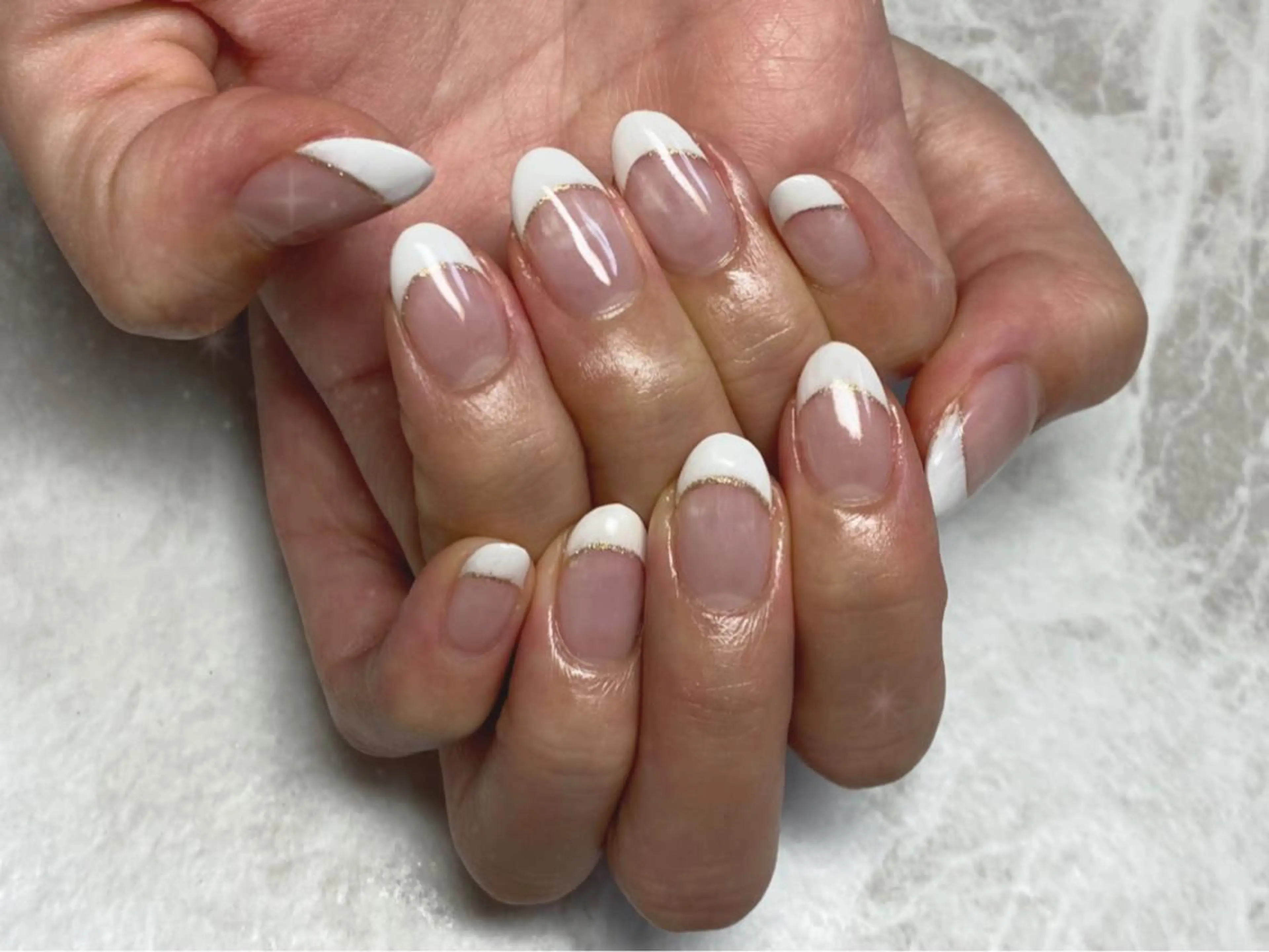 ネイル フレンチネイル ゴールド ラメ(グリッター) ネイルPetit Ribbonのネイルデザイン