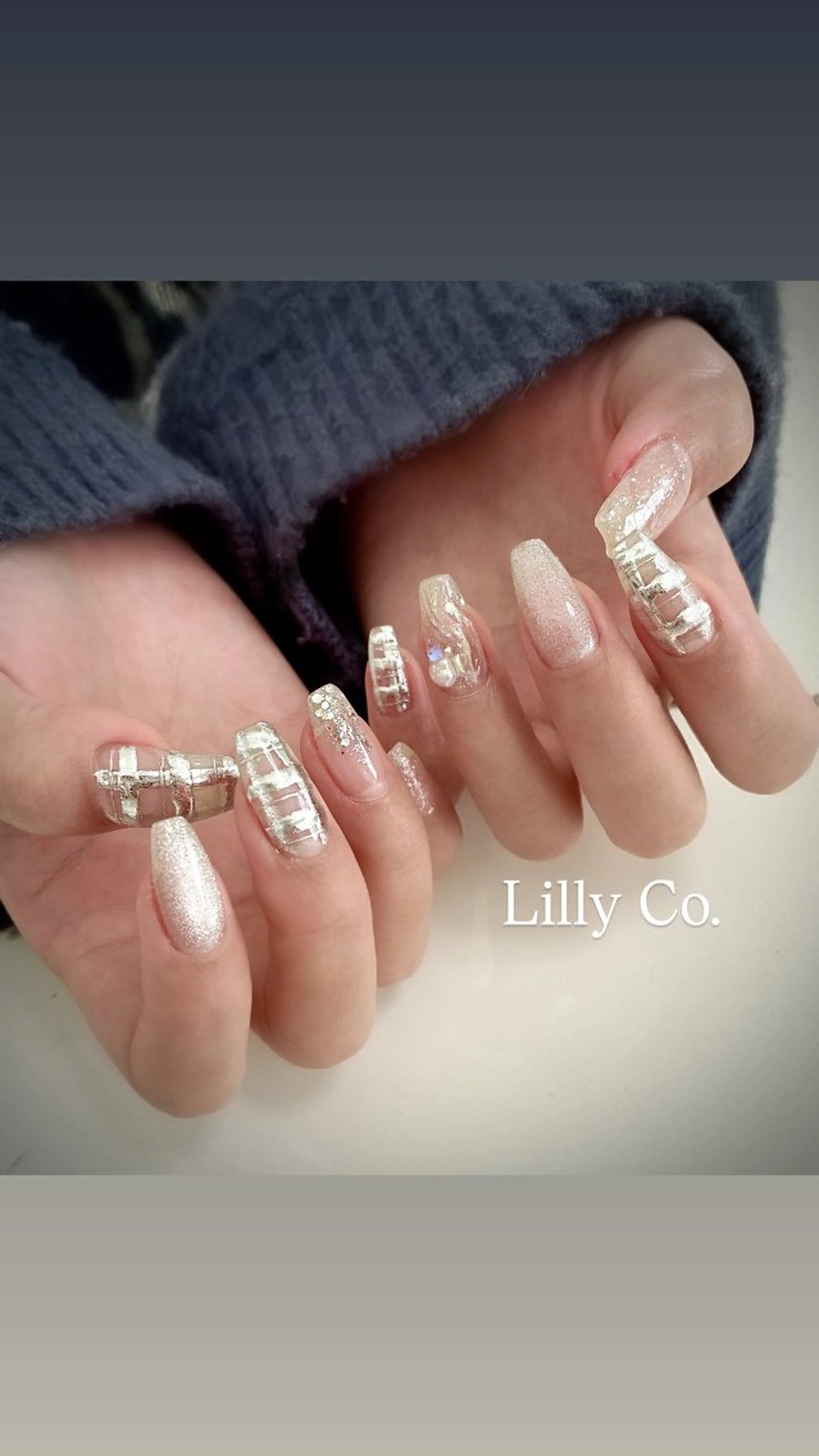 ネイル シルバー ハンドネイル ハンドケア Lilly Co.のネイルデザイン