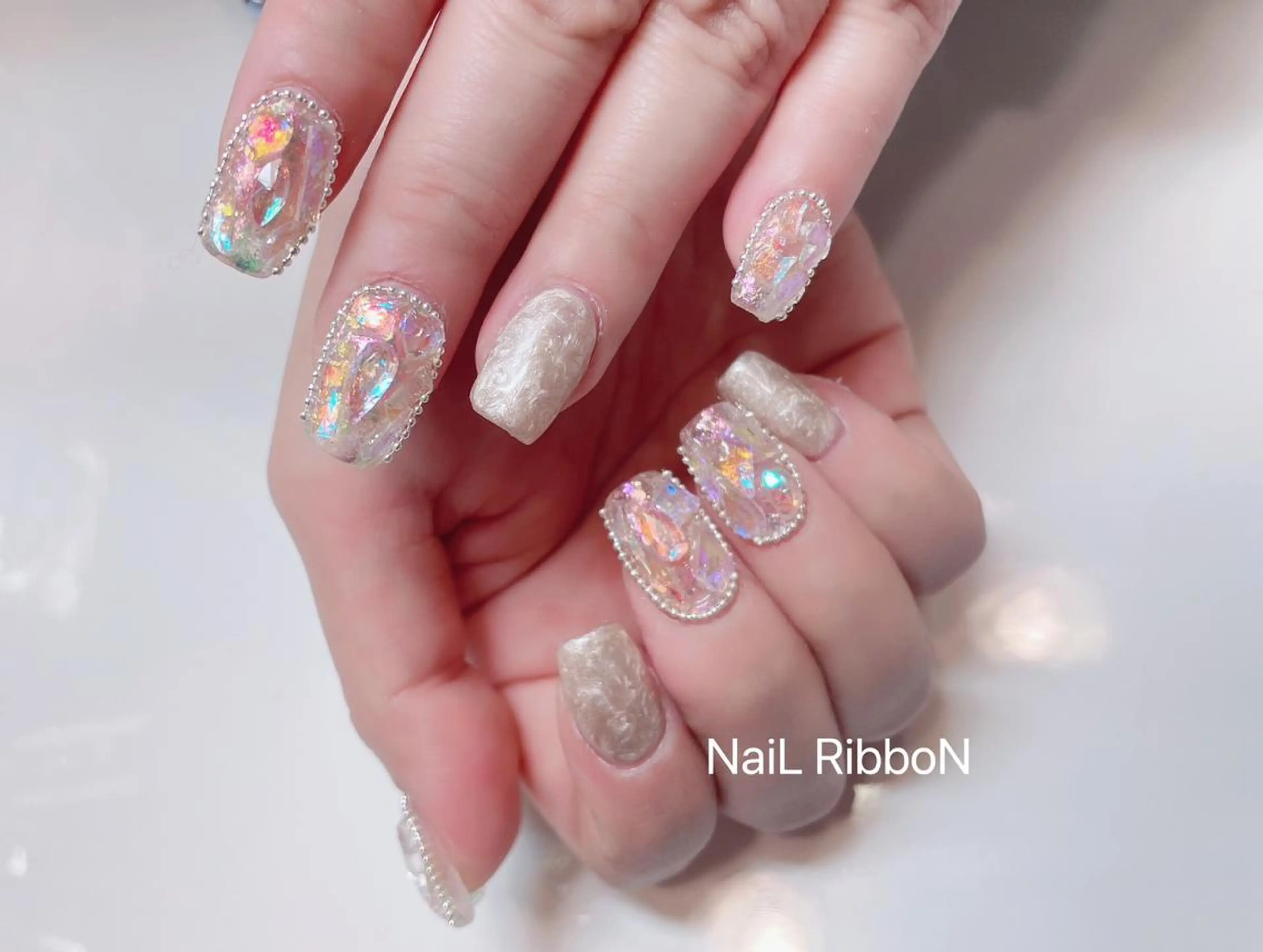 ネイル ネイルリボン 受付スタッフのネイルデザイン