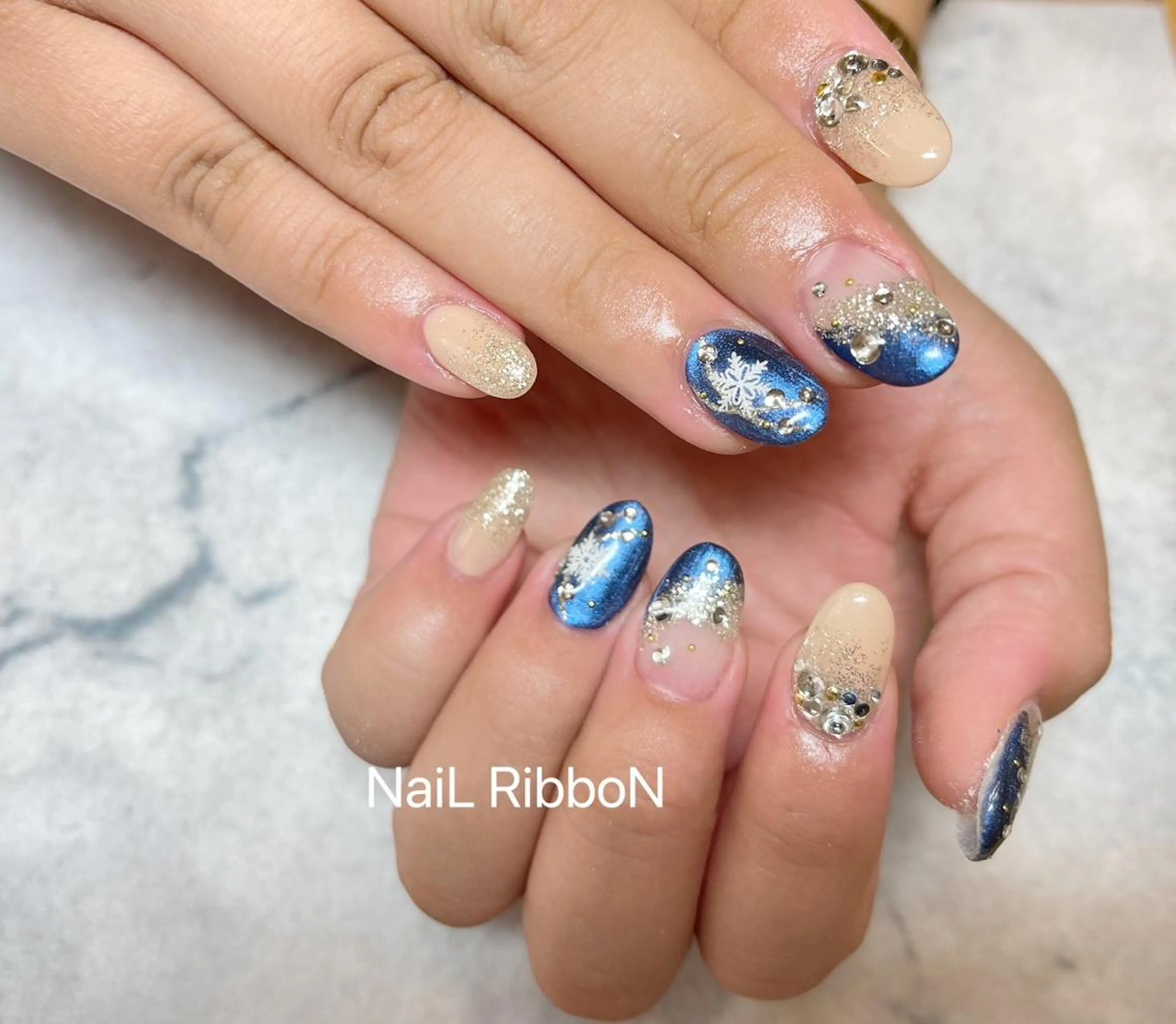 ネイル ネイルリボン 受付スタッフのネイルデザイン