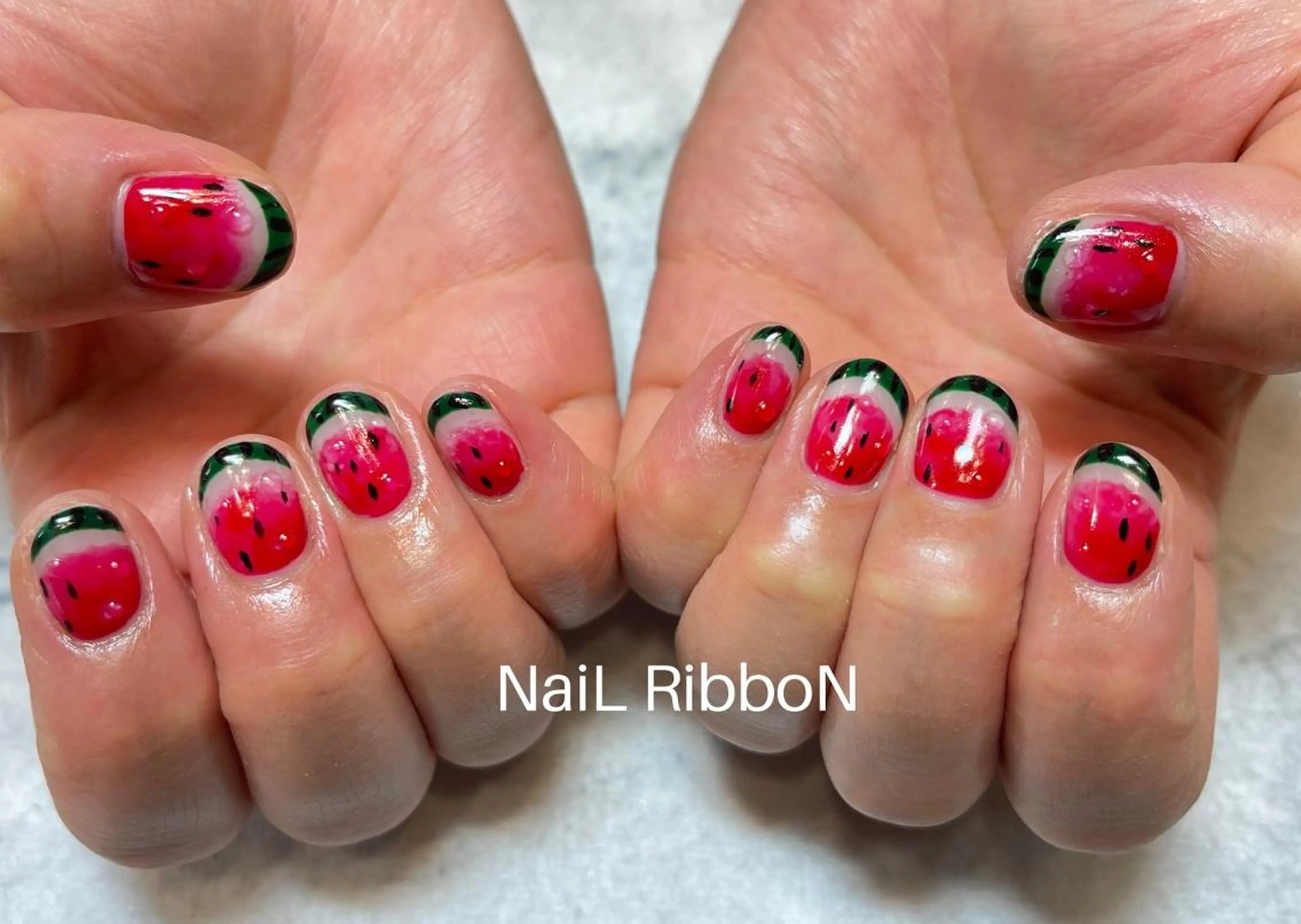 ネイル ネイルリボン 受付スタッフのネイルデザイン