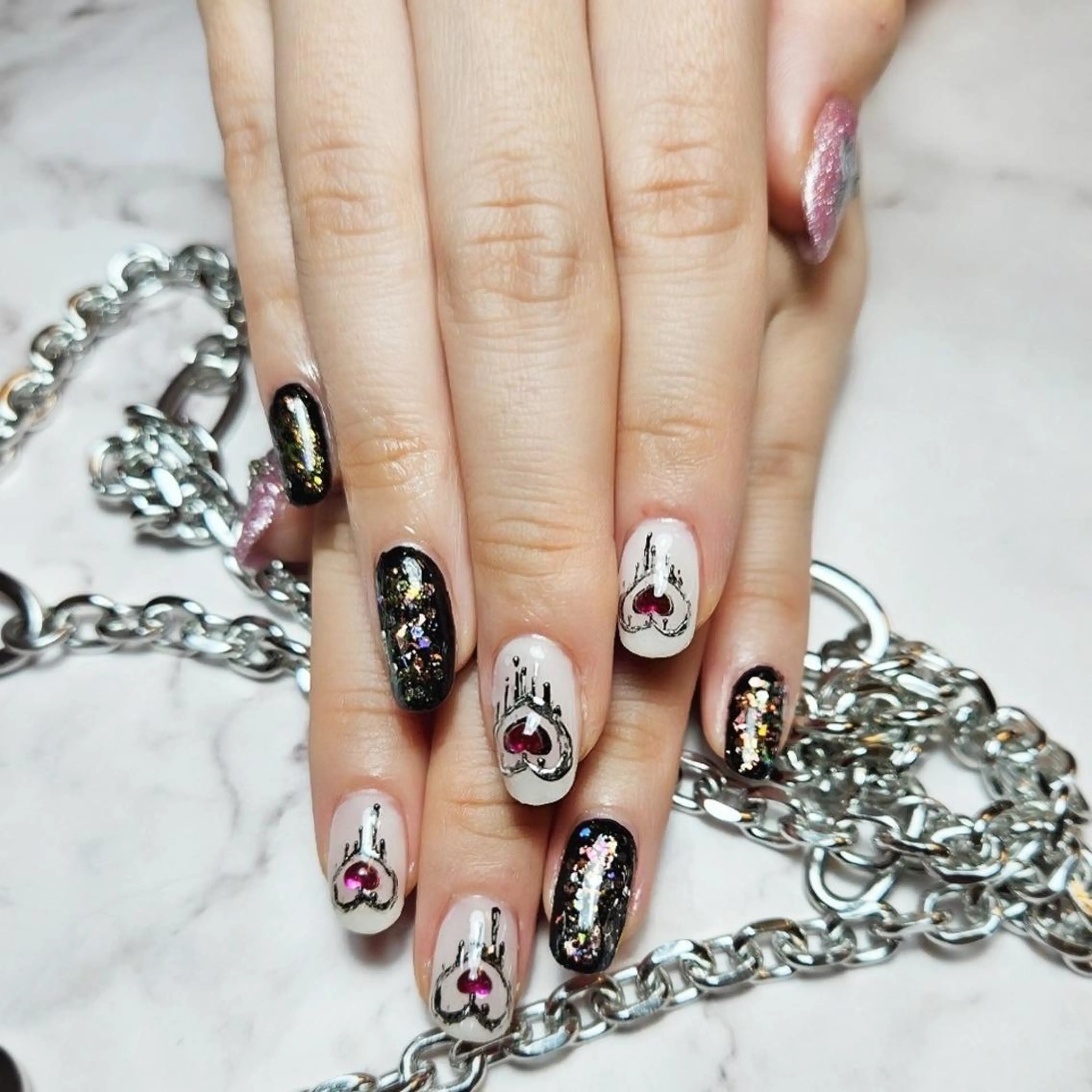 ネイル RAFFINE 月🦋🩵のネイルデザイン