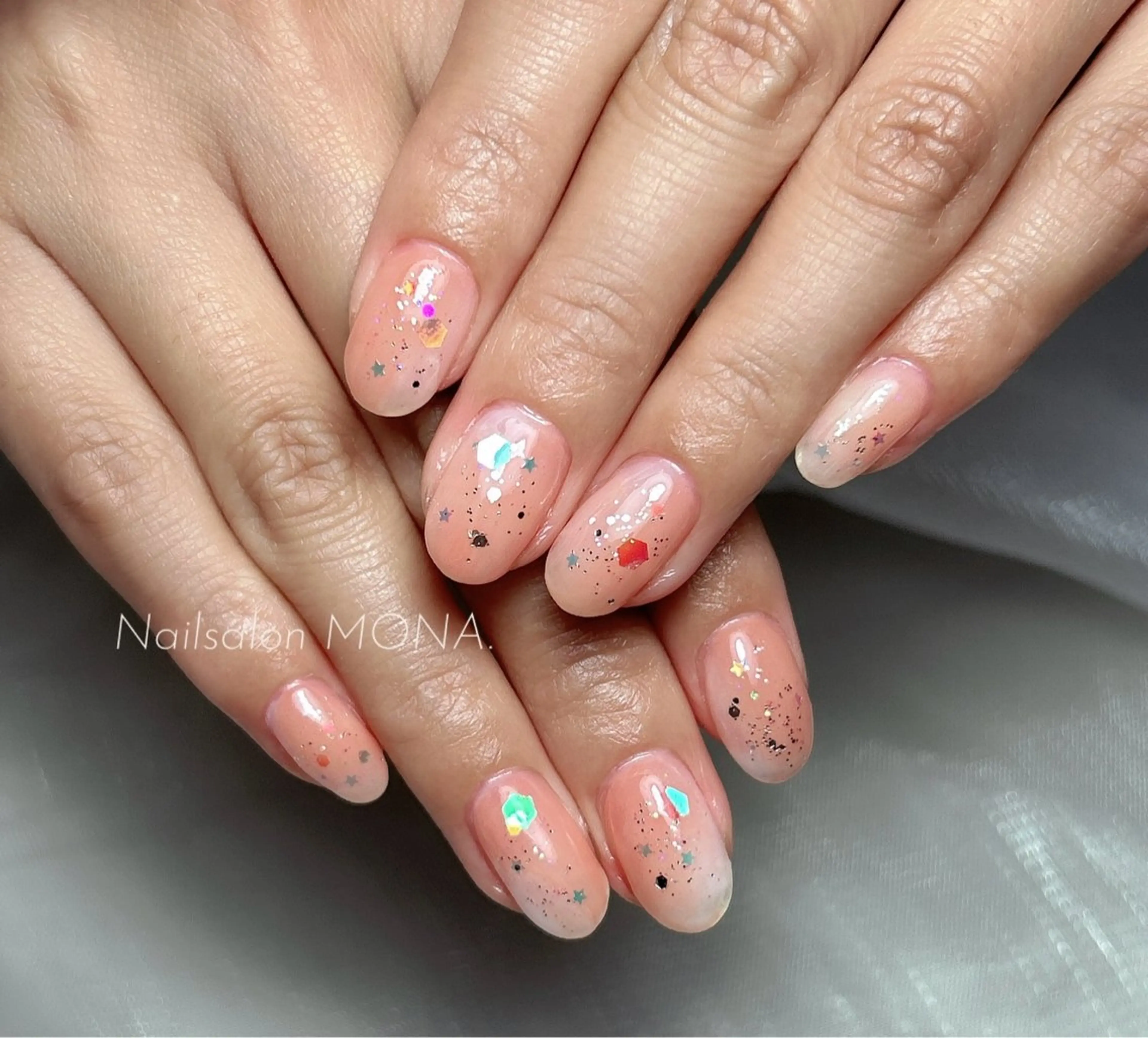 ネイル グラデーション ニュアンスネイル オレンジ ピンク ハンドネイル Nailsalon MONA.のネイルデザイン