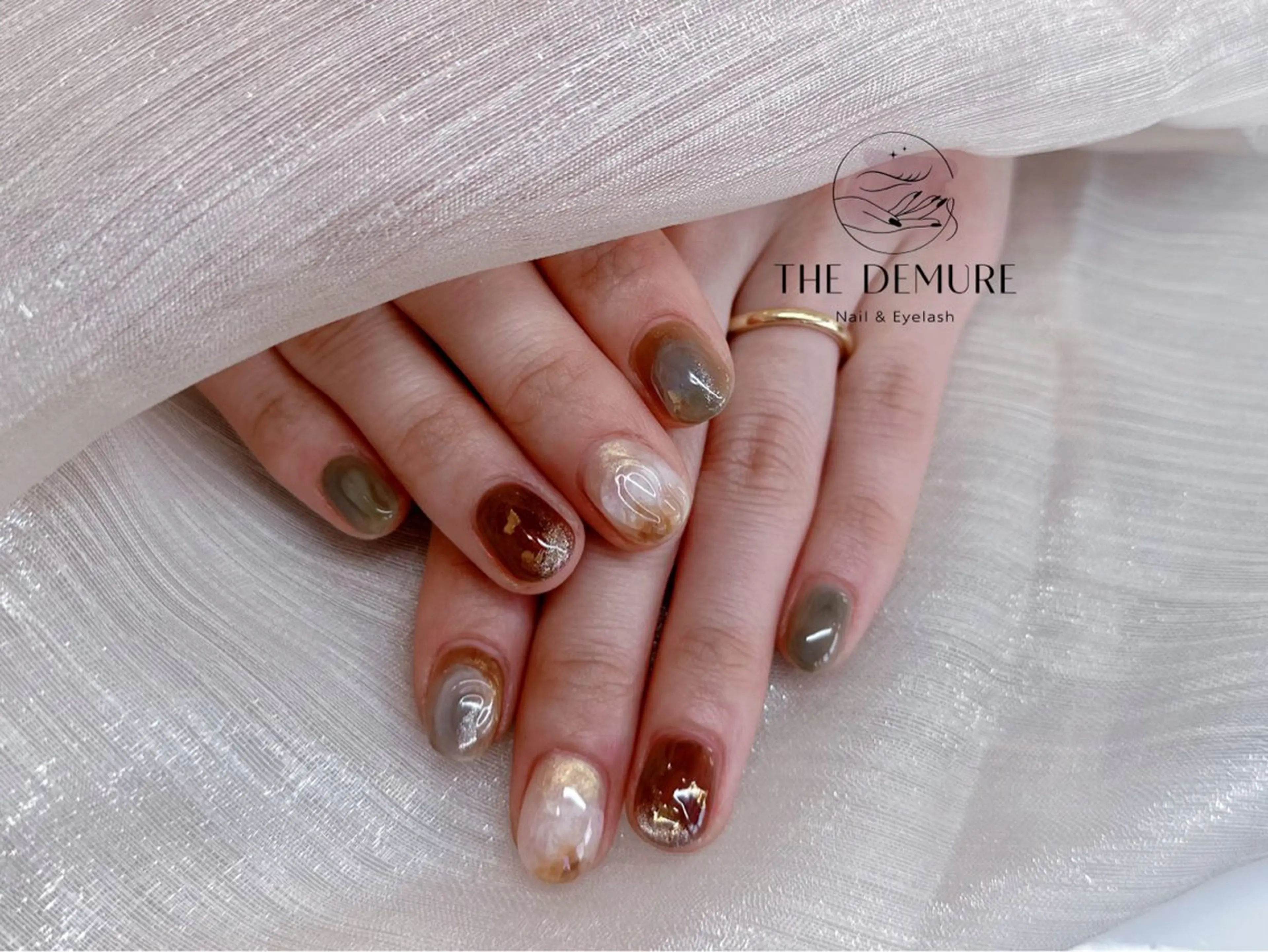 ネイル アートネイル キラキラネイル 韓国ネイル 水色 ロングネイル ハンドネイル ハンドケア NailDemure 【銀座店】のネイルデザイン