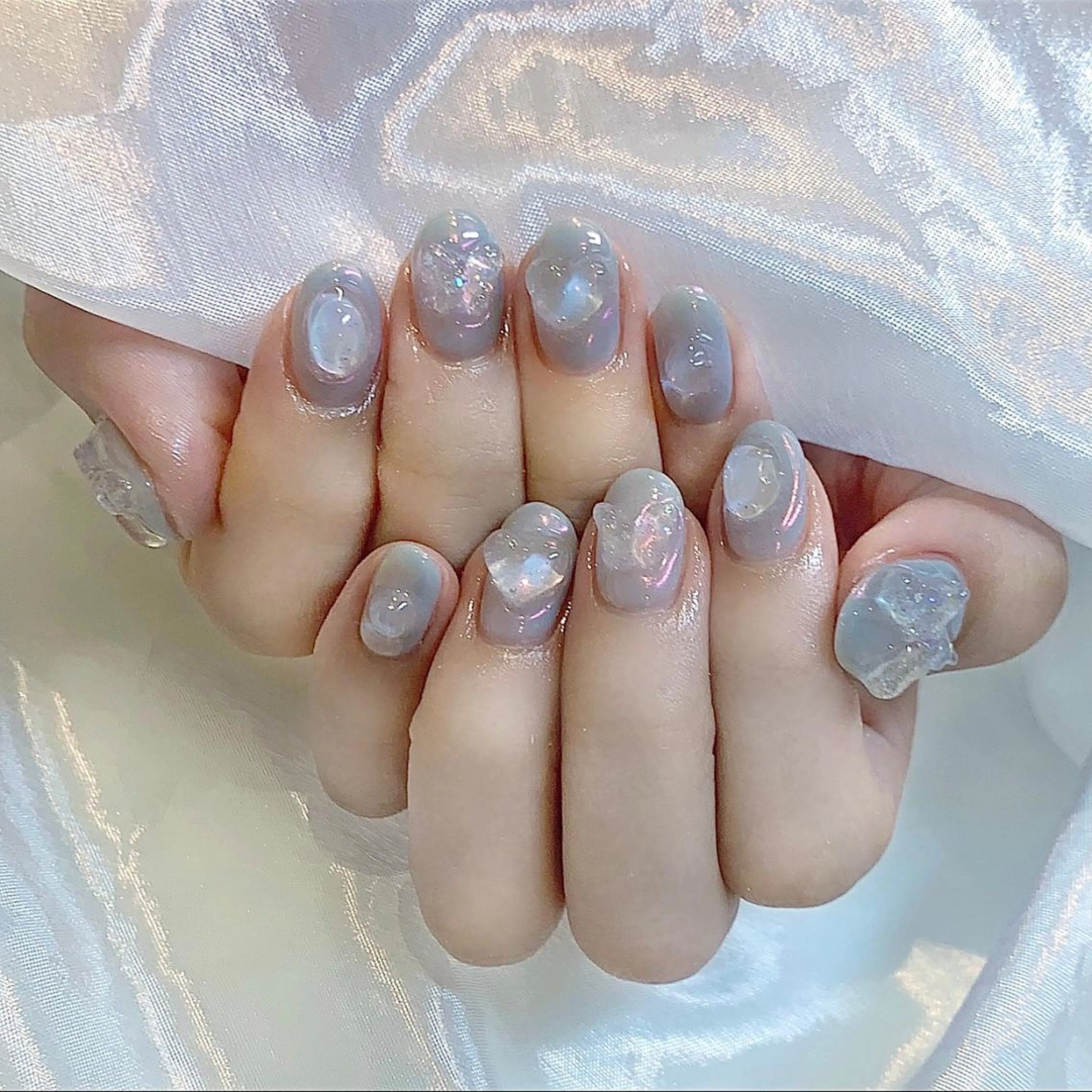 ネイル オーロラネイル クリアネイル 水色 ピンク ハンドネイル Kanon 🤍のネイルデザイン