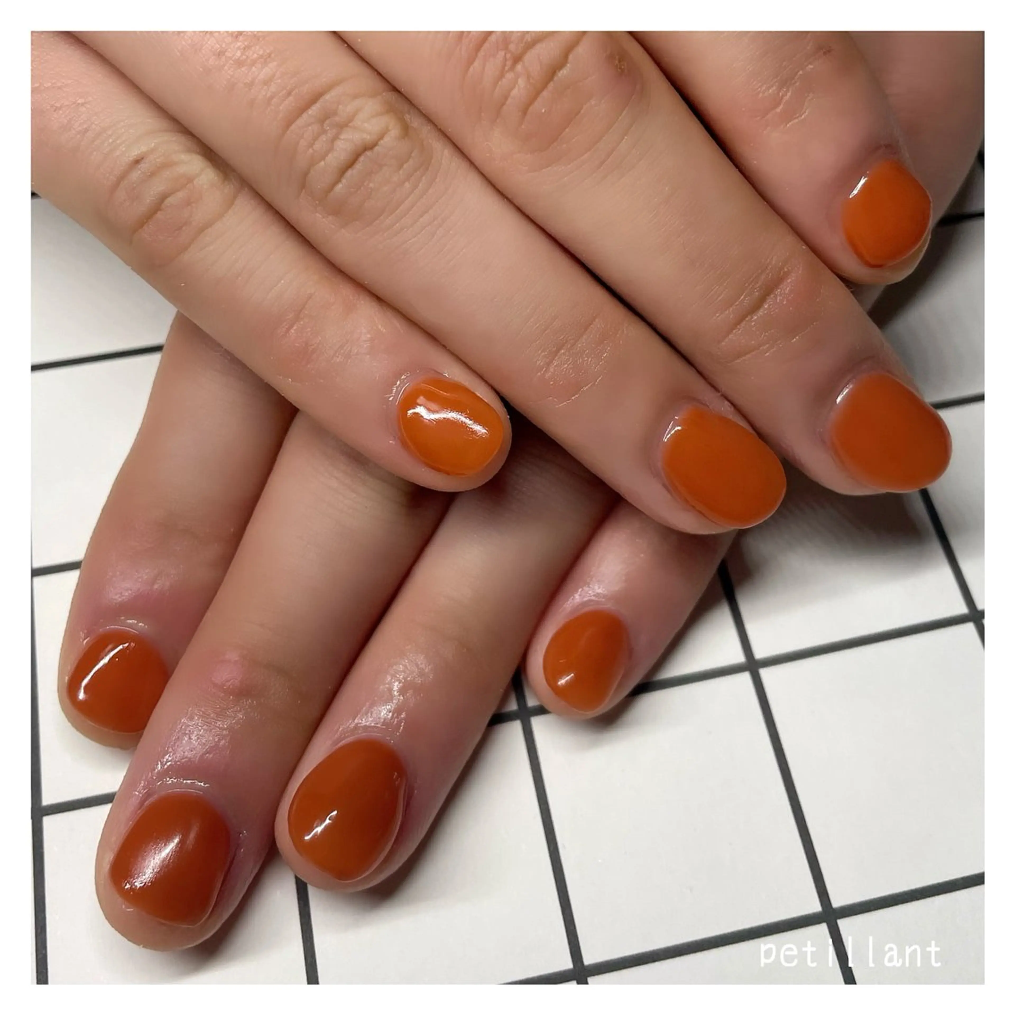 ネイル 長さ出し ジェルネイル オレンジ petillant所属・nail salon petillantのネイルデザイン
