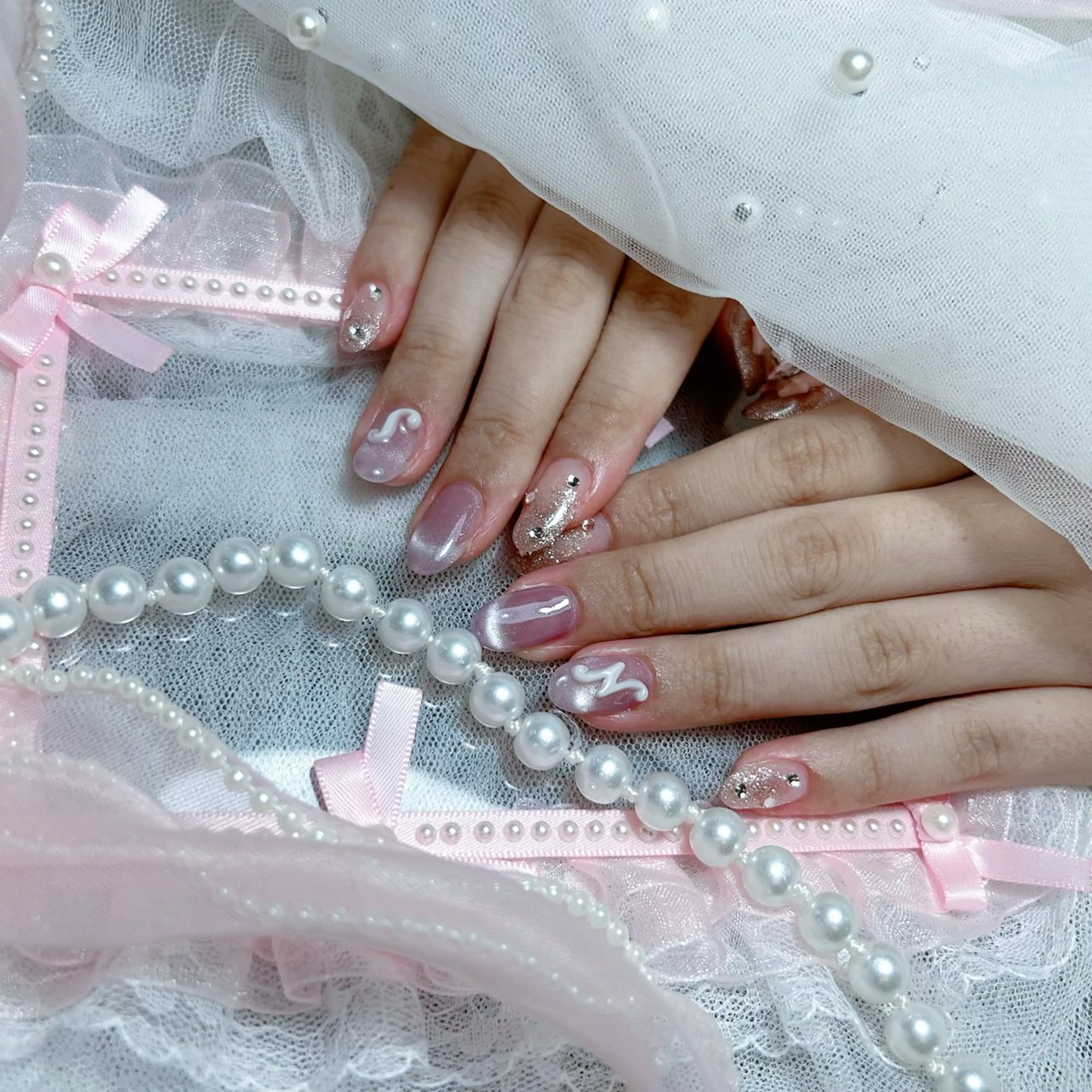 ネイル Yudia🩵 Yuiのネイルデザイン