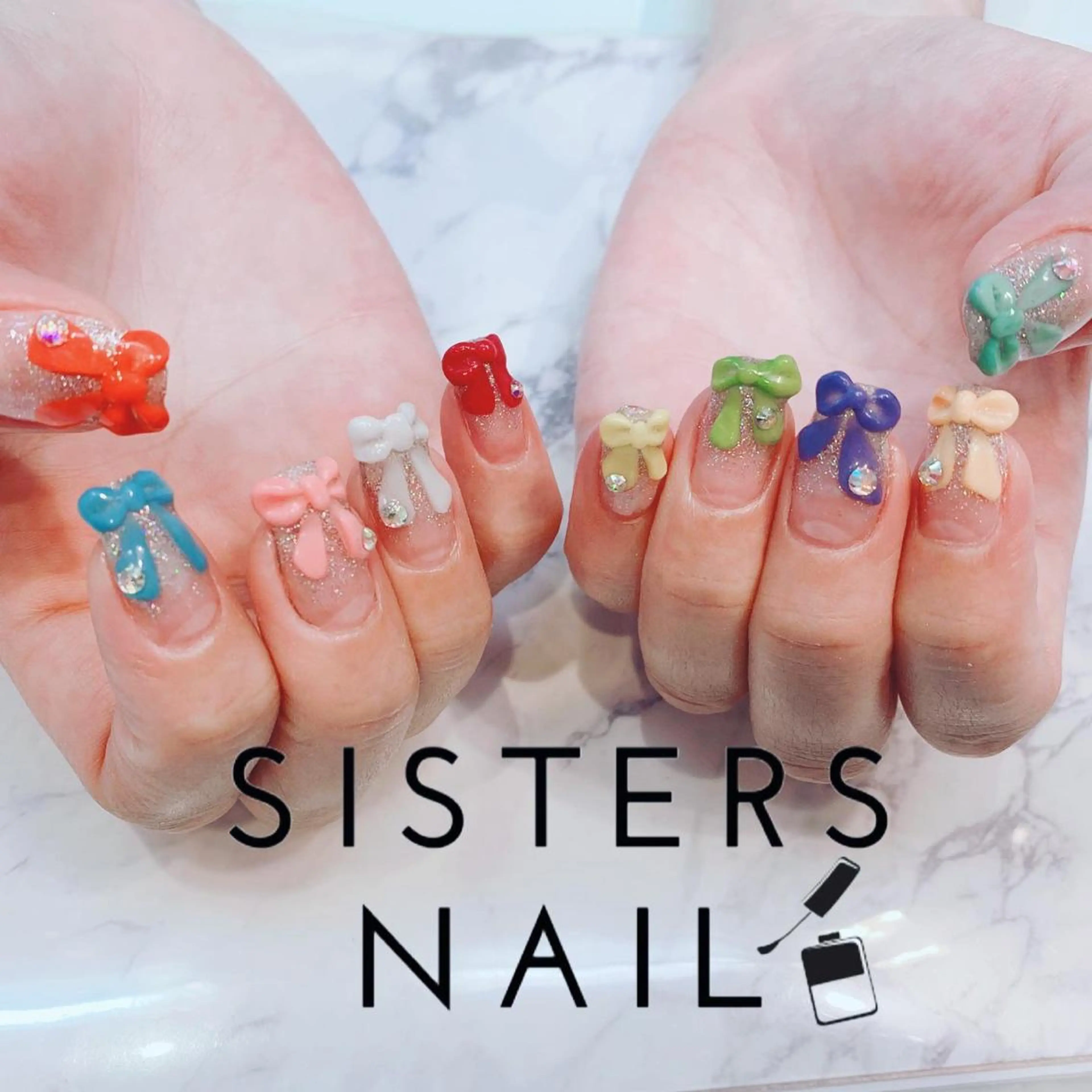 ネイル リボン ハンドネイル ハンドケア sisters nail.fのネイルデザイン
