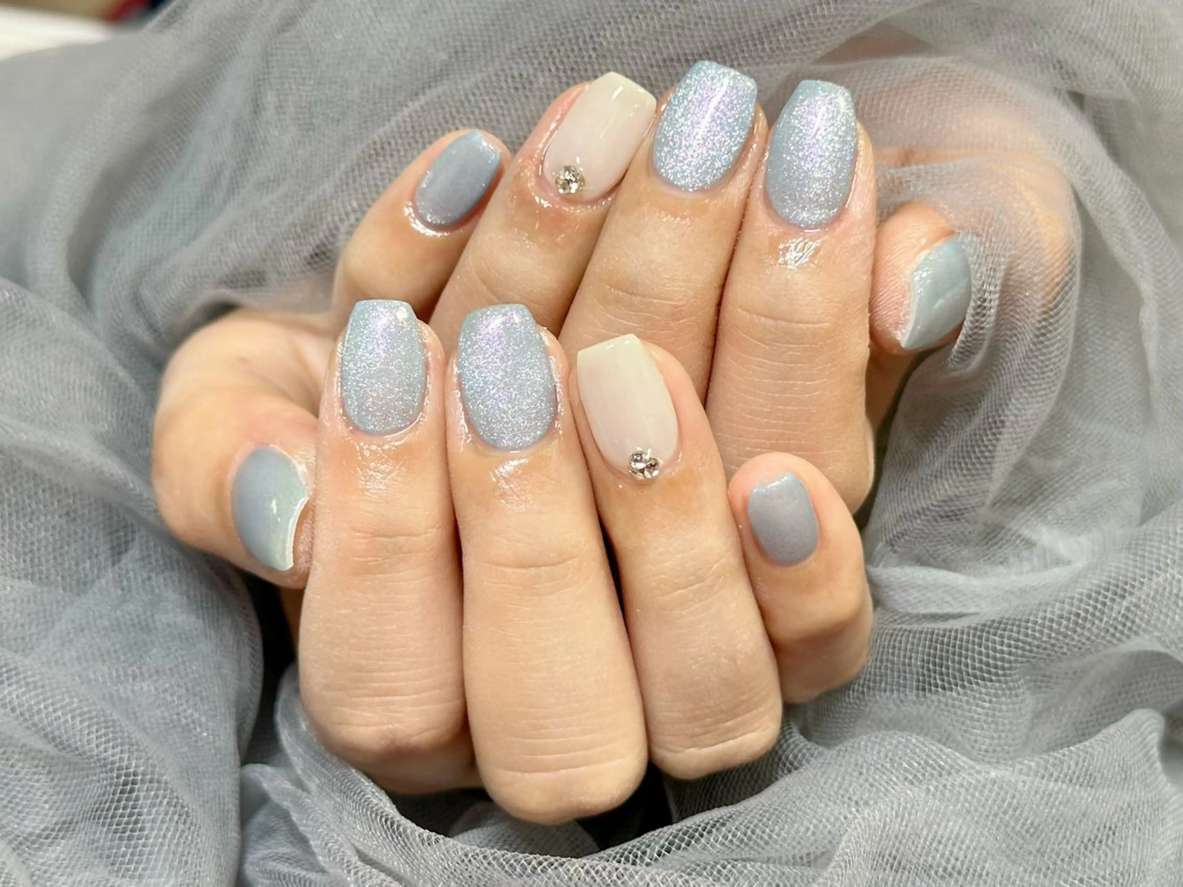 ネイル 水色 マグネットネイル ストーンネイル ハンドネイル KURELLY所属・Nail Salon KURELLYのネイルデザイン