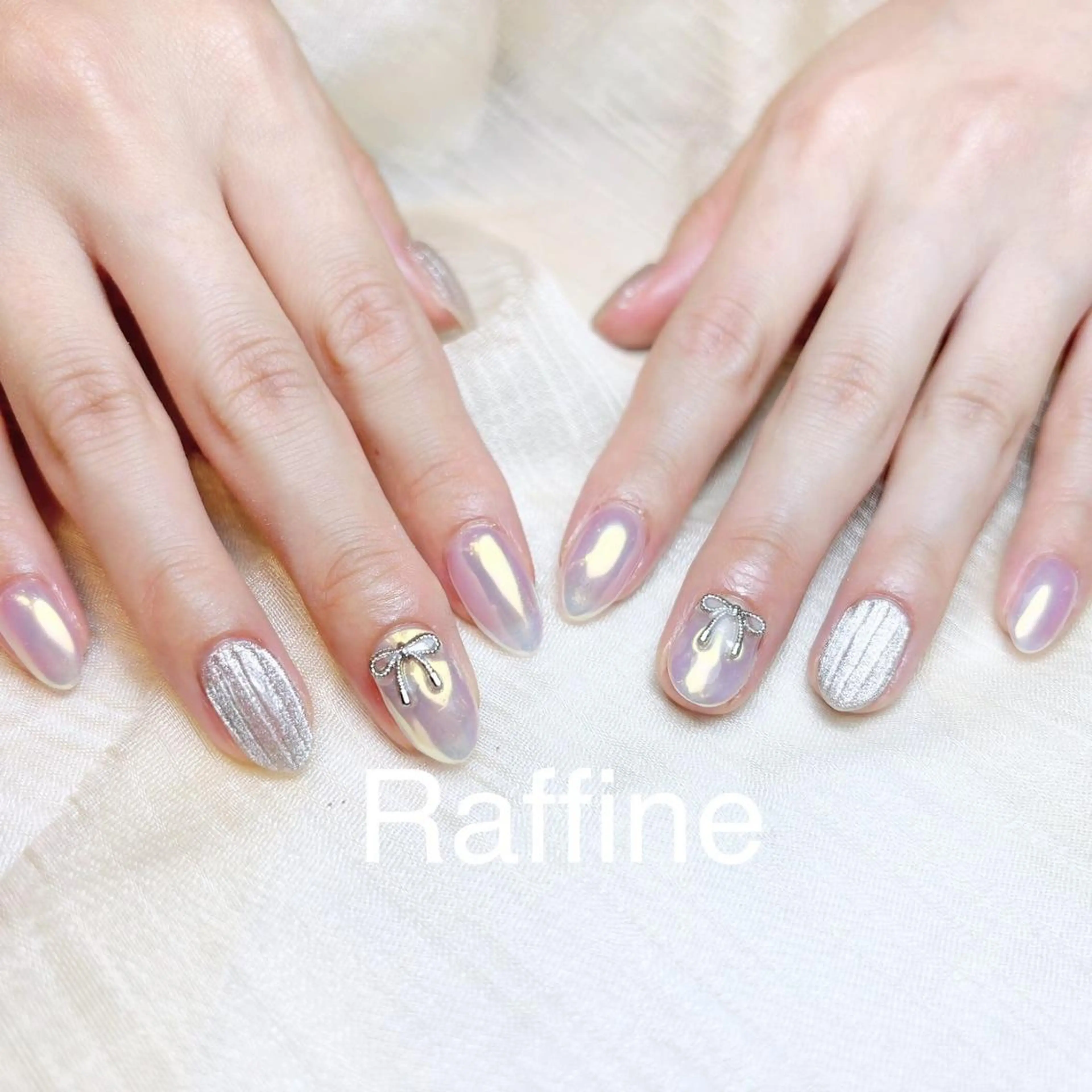 ネイル ハンドネイル RAFFINE 月🦋🩵のネイルデザイン