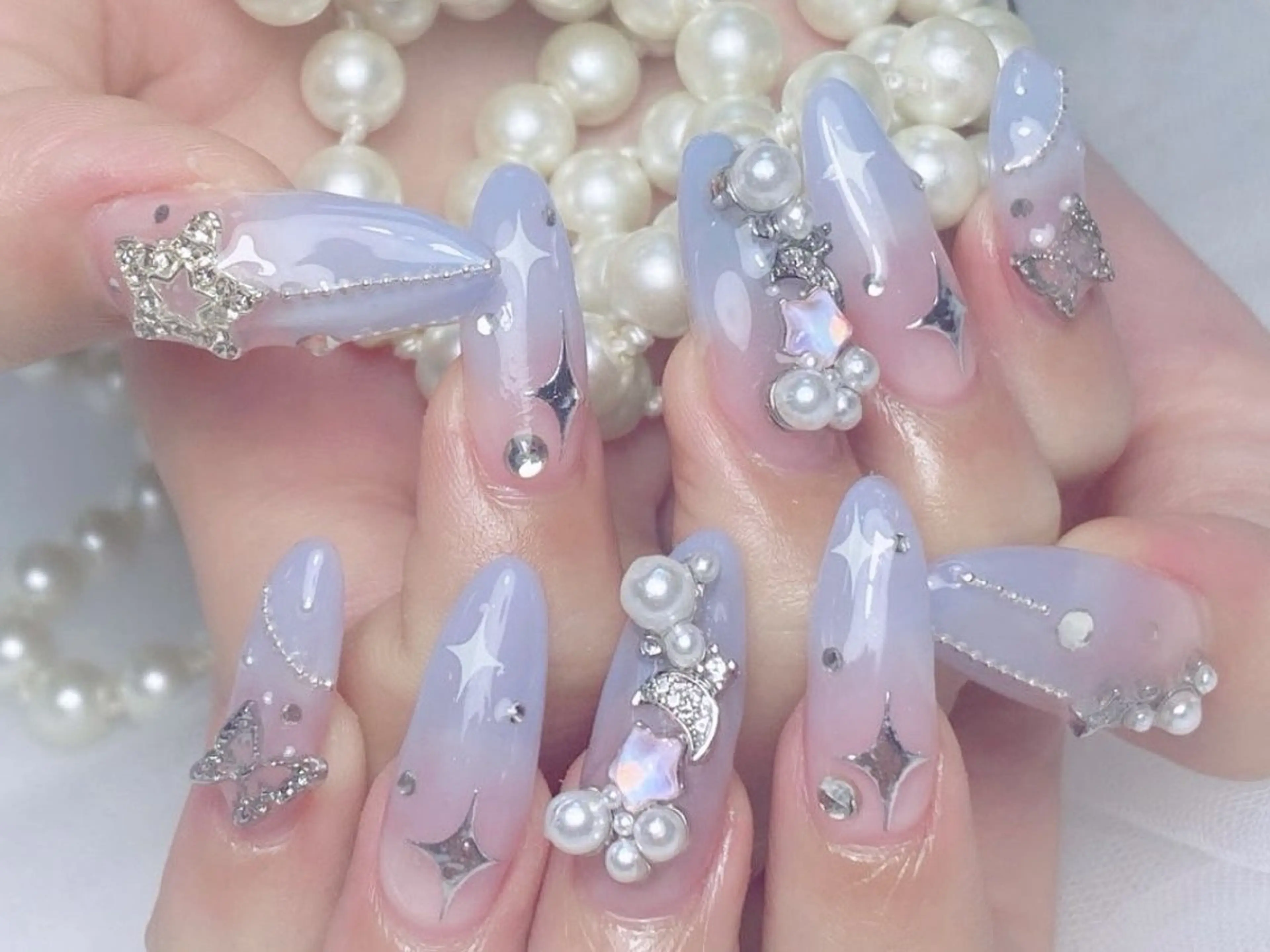 🩵🩵チップ長さ出し+持ち込みデザイン(🔆デザイン、パーツ10本ok)の写真