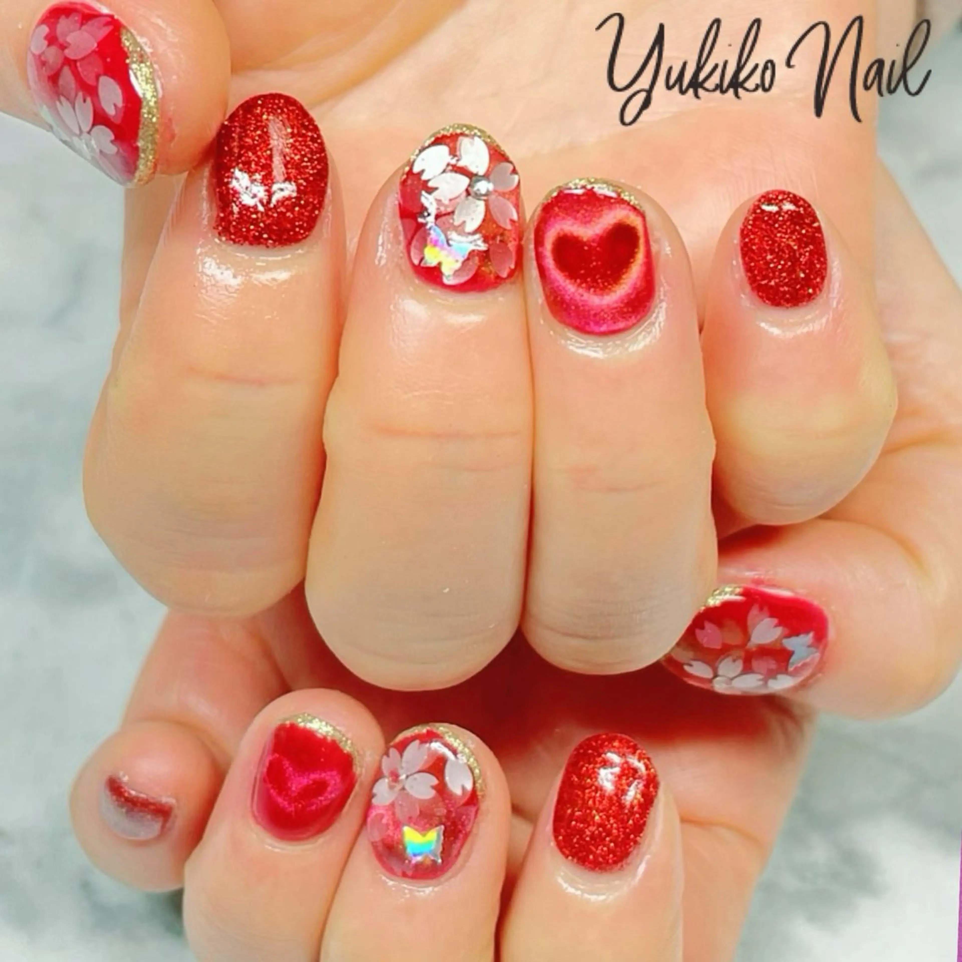 ネイル 桜ネイル ハート マグネットネイル 赤色 春ネイル ハンドネイル ユキコ ネイルのネイルデザイン