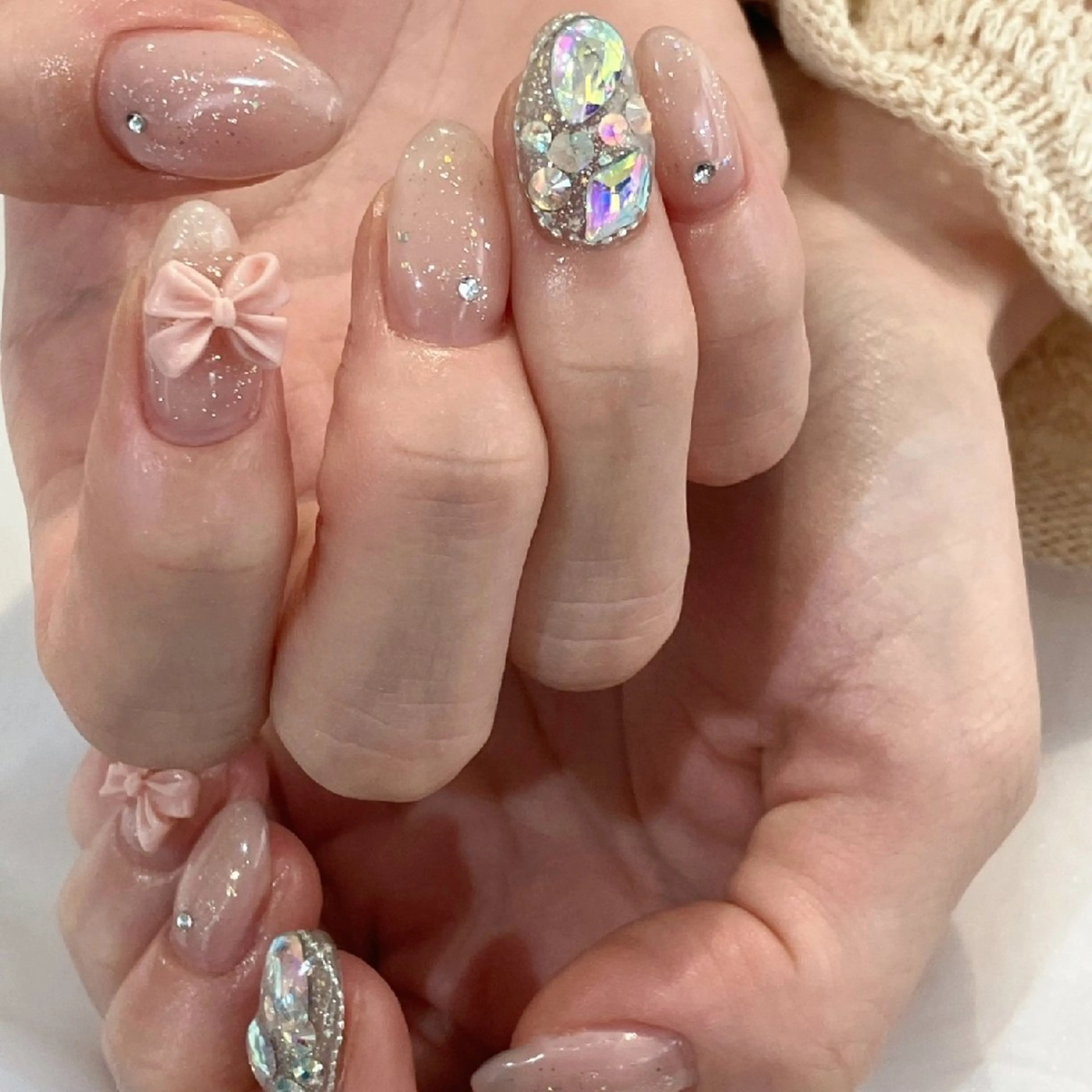 ネイル キラキラネイル 韓国ネイル ワンカラーネイル リボン ストーンネイル ハンドネイル felicita服部店所属・felicita fumi♡のネイルデザイン