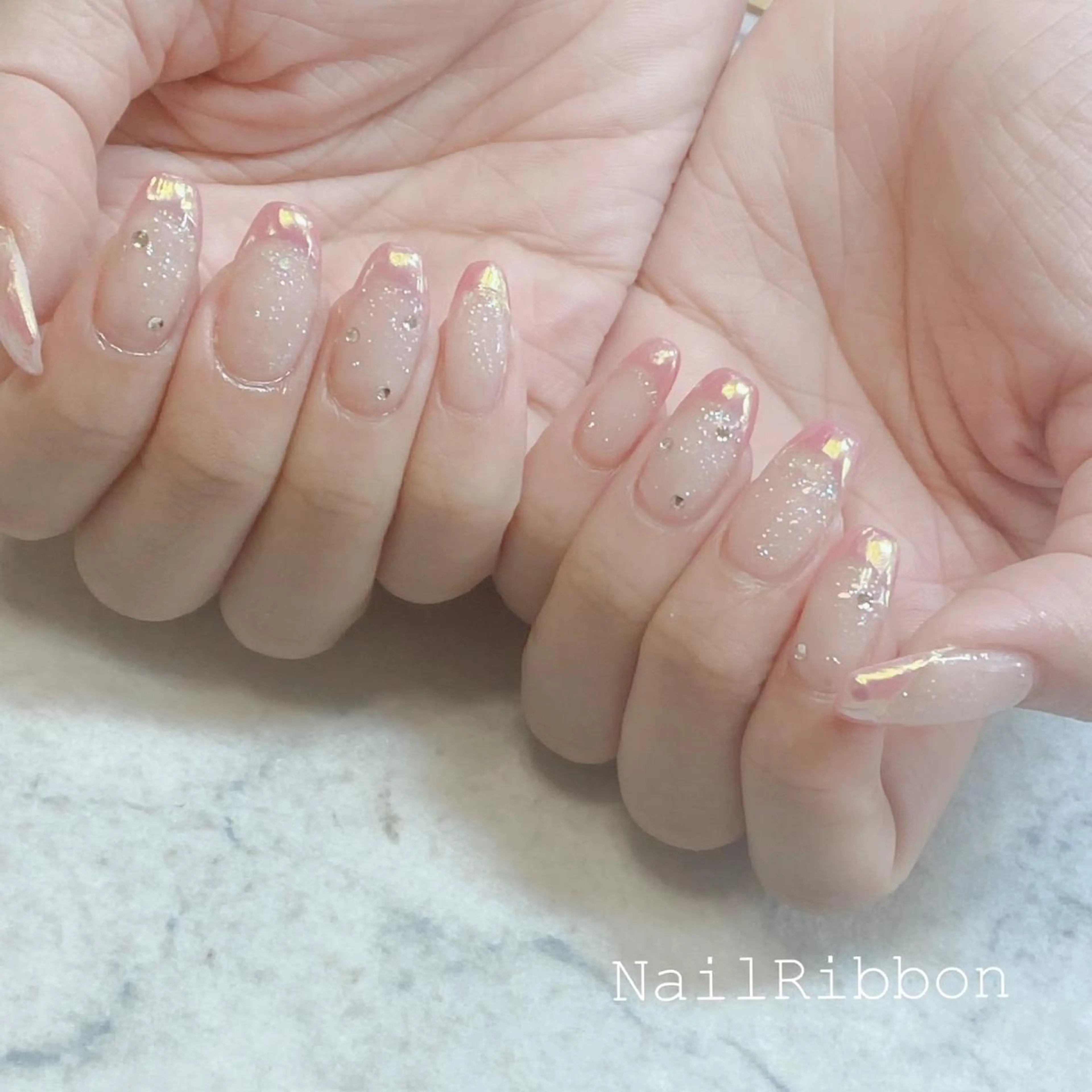 ネイル ネイルリボン 受付スタッフのネイルデザイン