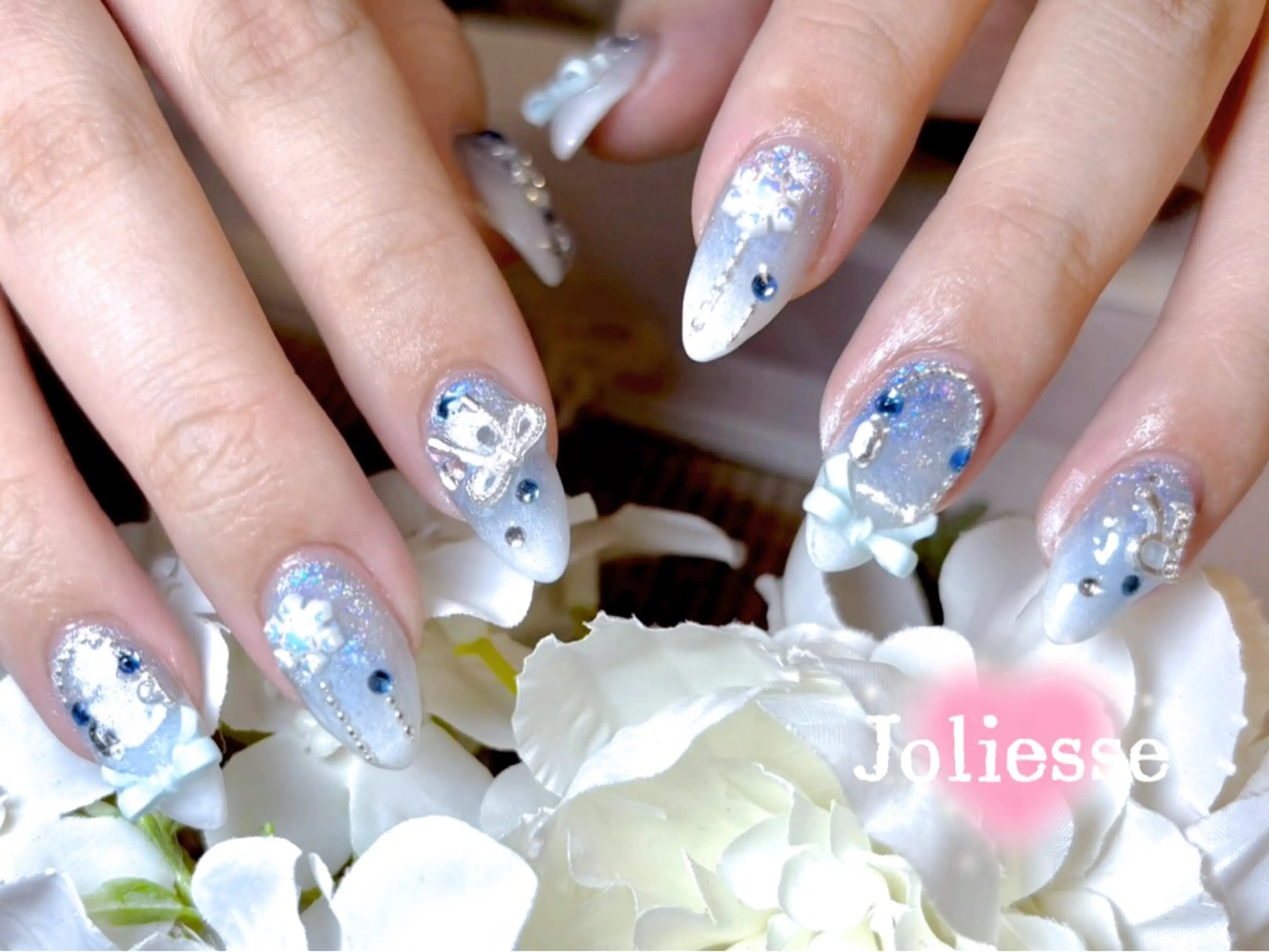 ネイル ブルー リボン Joliesse nail salonのネイルデザイン