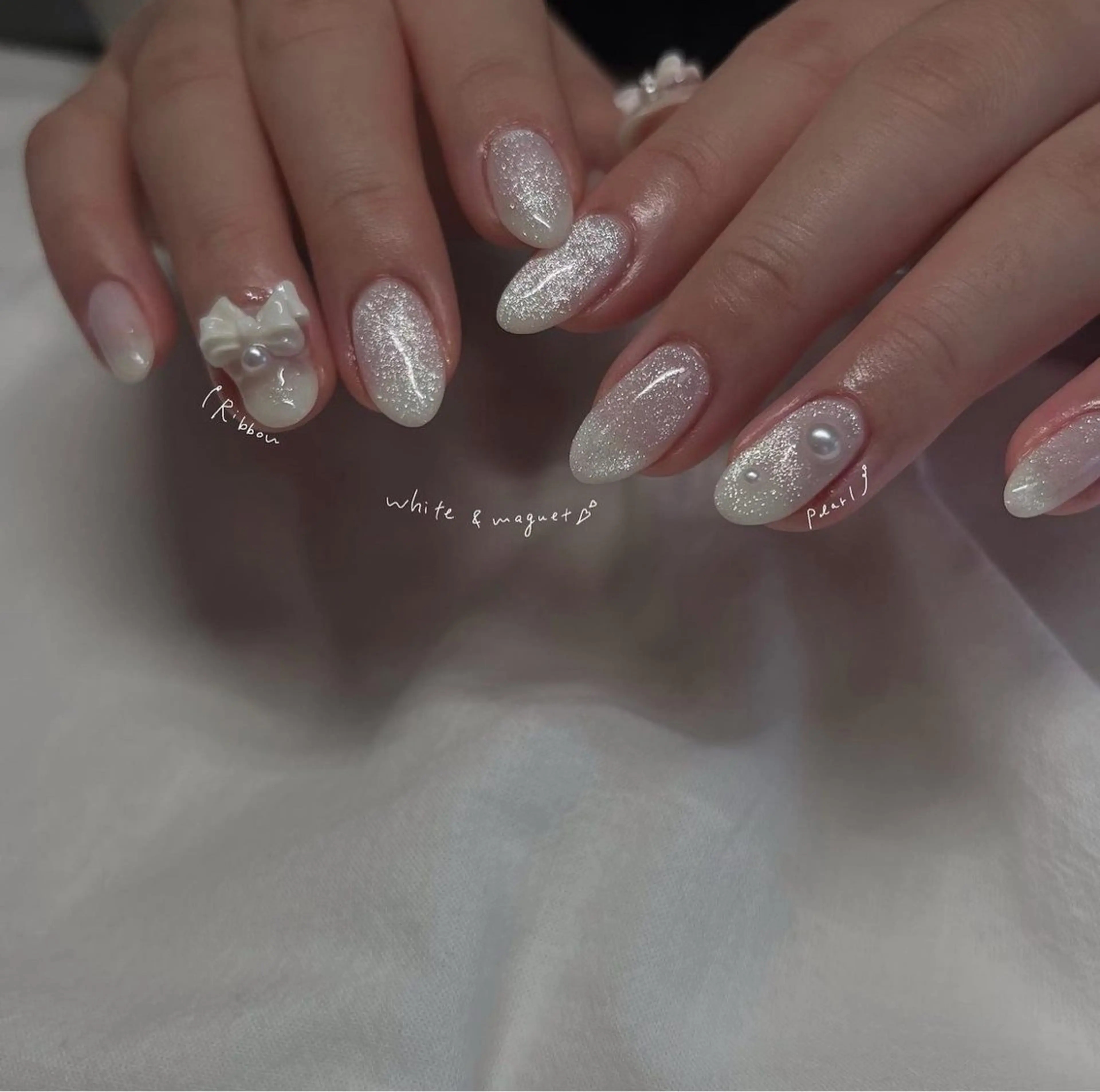 ネイル 氷ネイル・うるうるネイル キラキラネイル マグネットネイル ニュアンスネイル リボン ハンドネイル &. momoのネイルデザイン