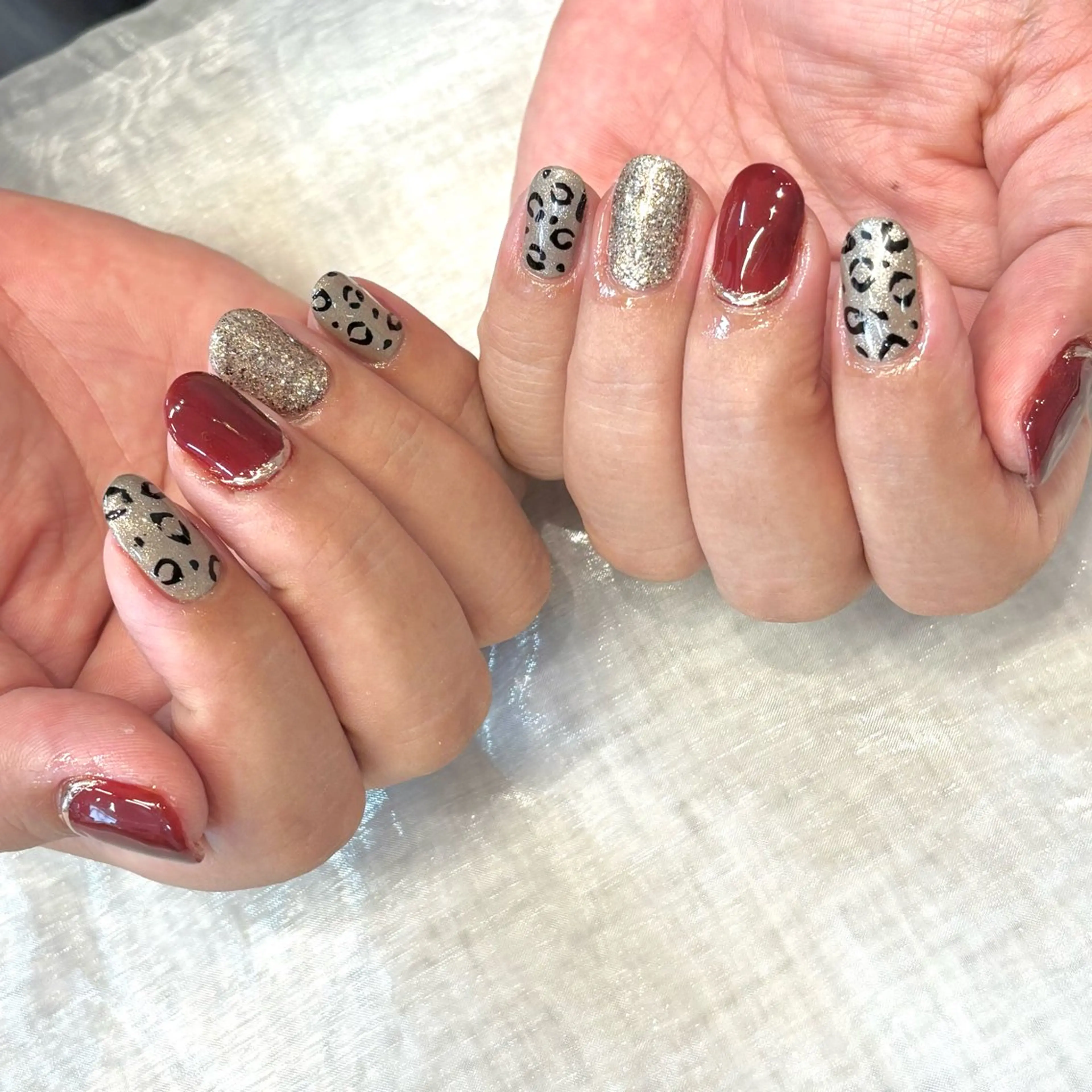 ネイル アニマル柄 ボルドー ジェルネイル ラメ(グリッター) ミラーネイル ハンドネイル Chipie_ ayanoのネイルデザイン
