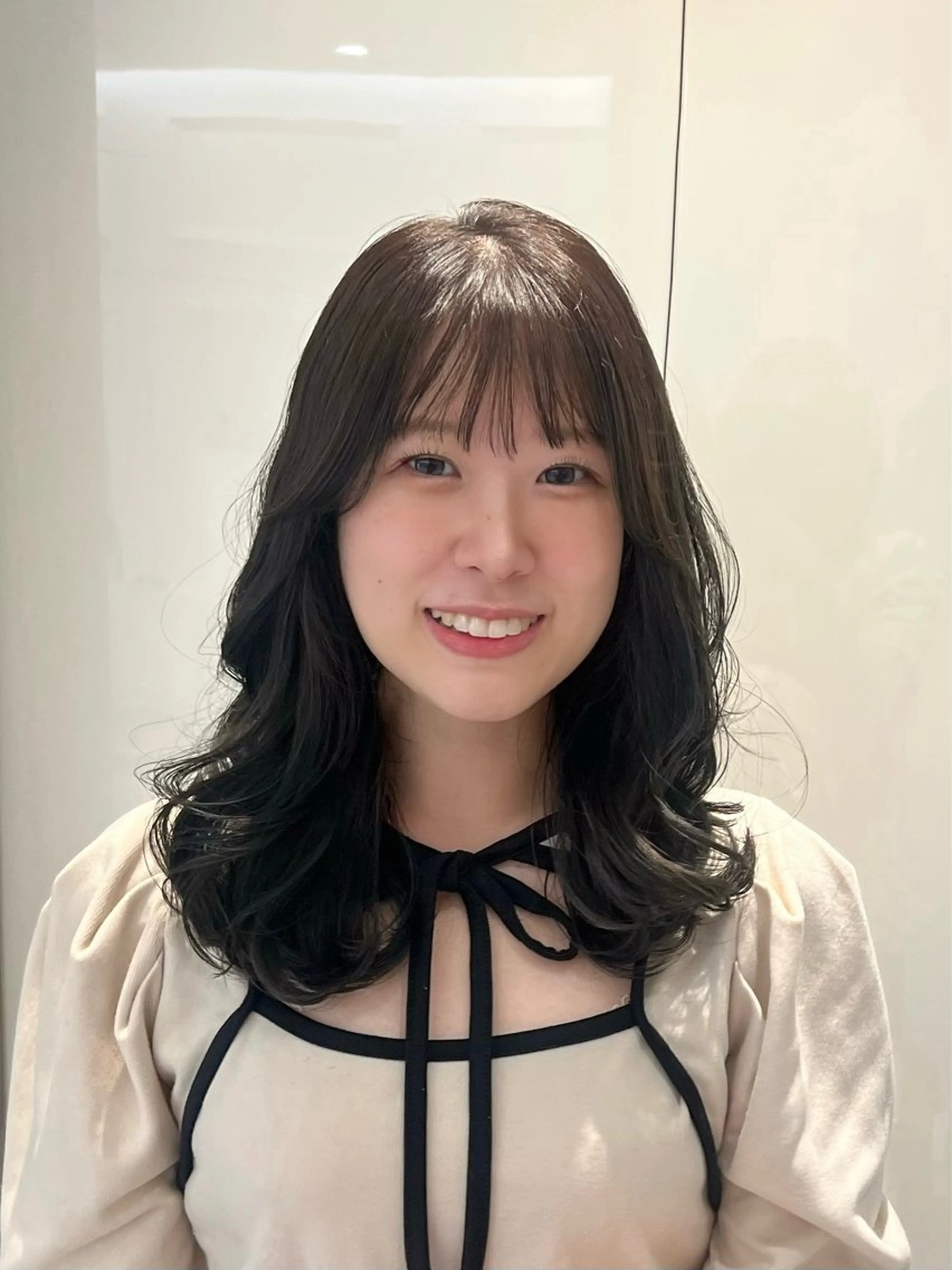 セミロング コテ巻き風パーマ 銀座RINOSEのヘアスタイル