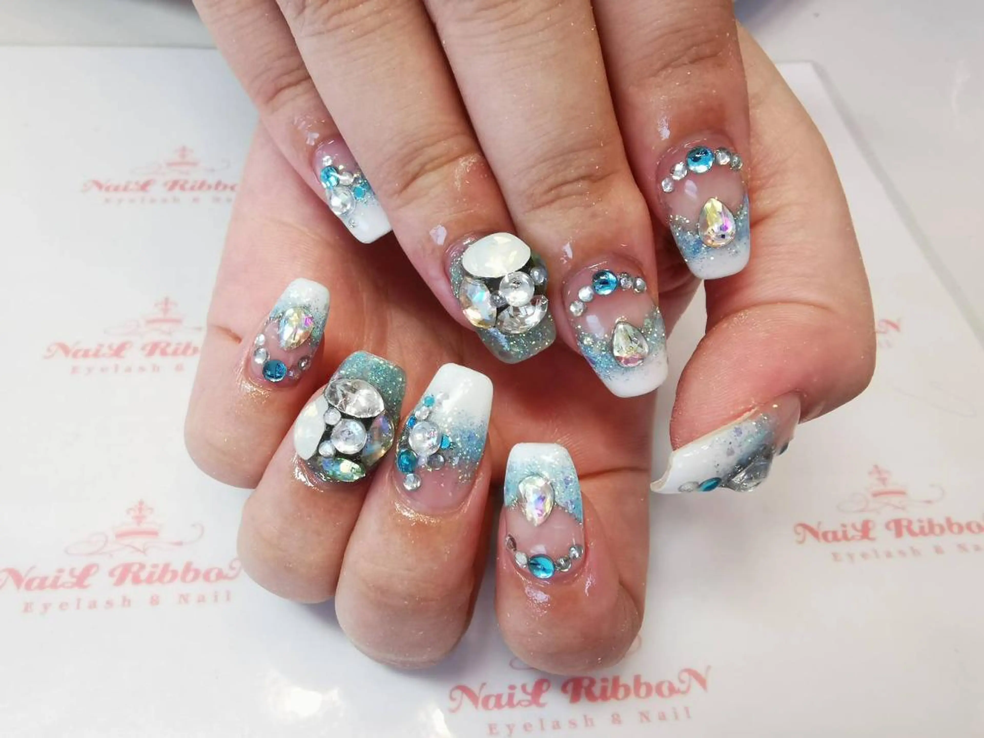 ネイル ネイルリボン 受付スタッフのネイルデザイン