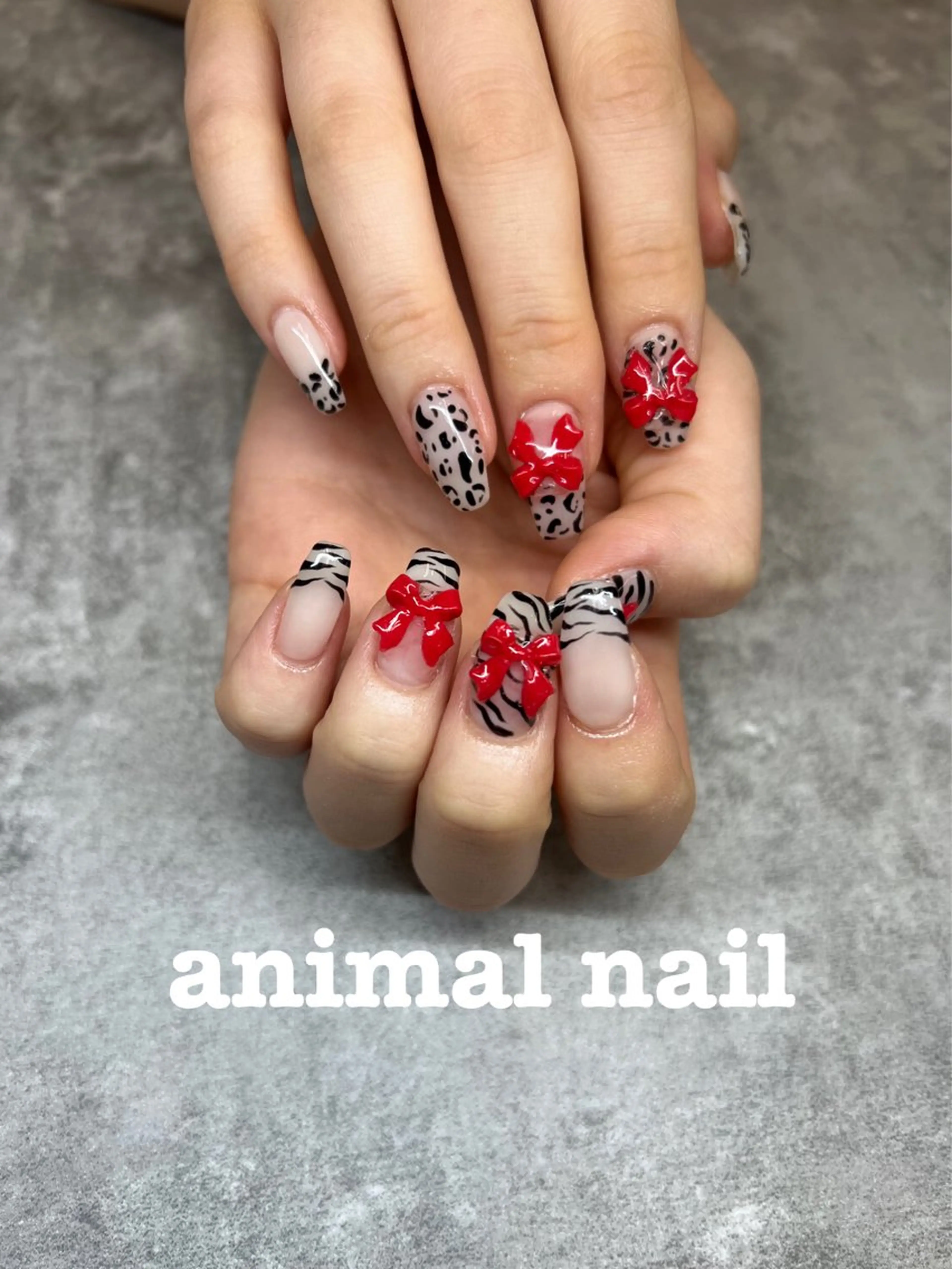 ネイル アニマル柄 韓国ネイル リボン ハンドネイル Luann nail所属・Luann nail Sakiのネイルデザイン
