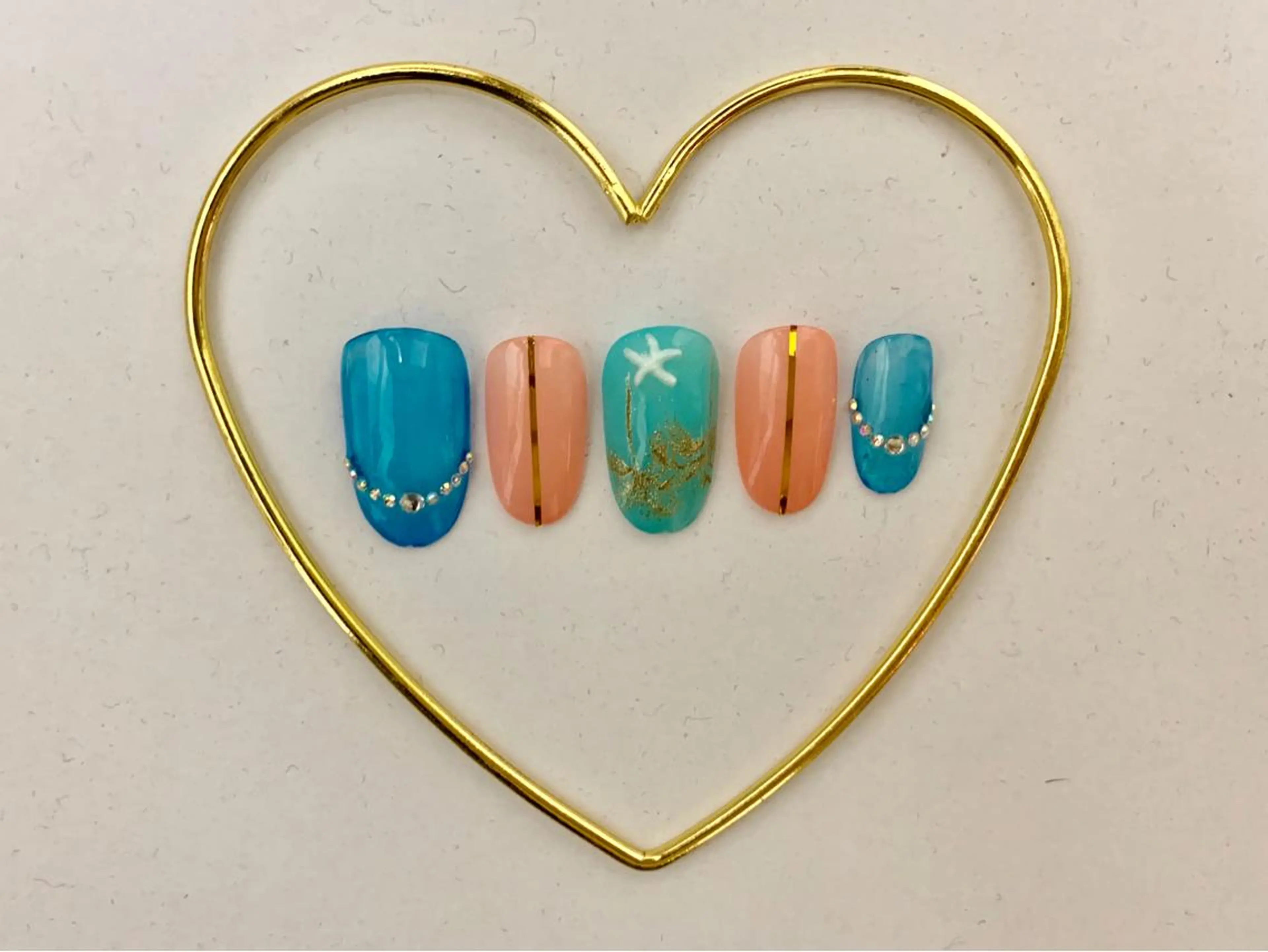 ネイル ブルー オレンジ ストーンネイル noheanail YONEDAのネイルデザイン