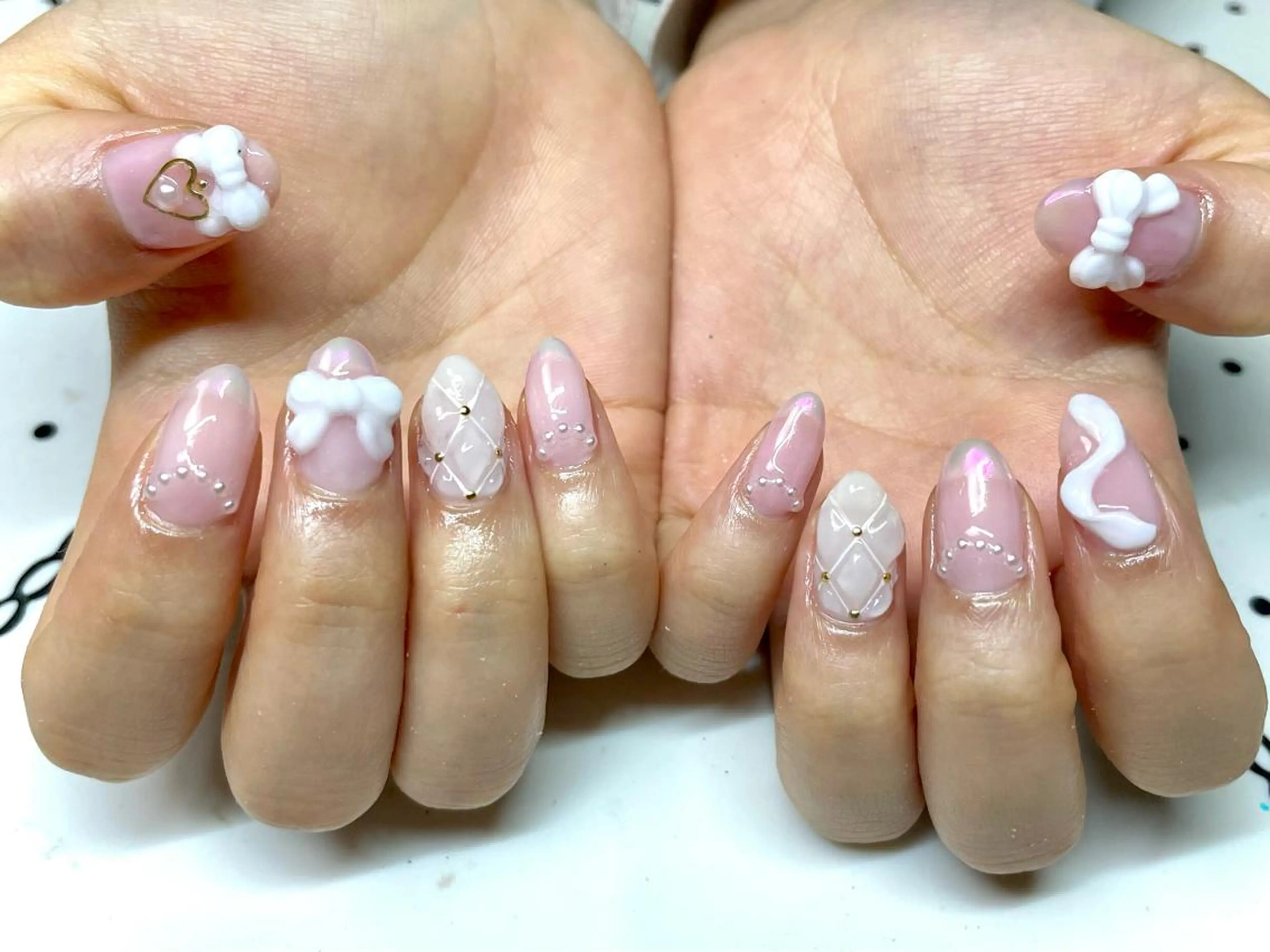 ネイル リボン ハンドネイル nailsalon sugarr所属・nailist cocoのネイルデザイン