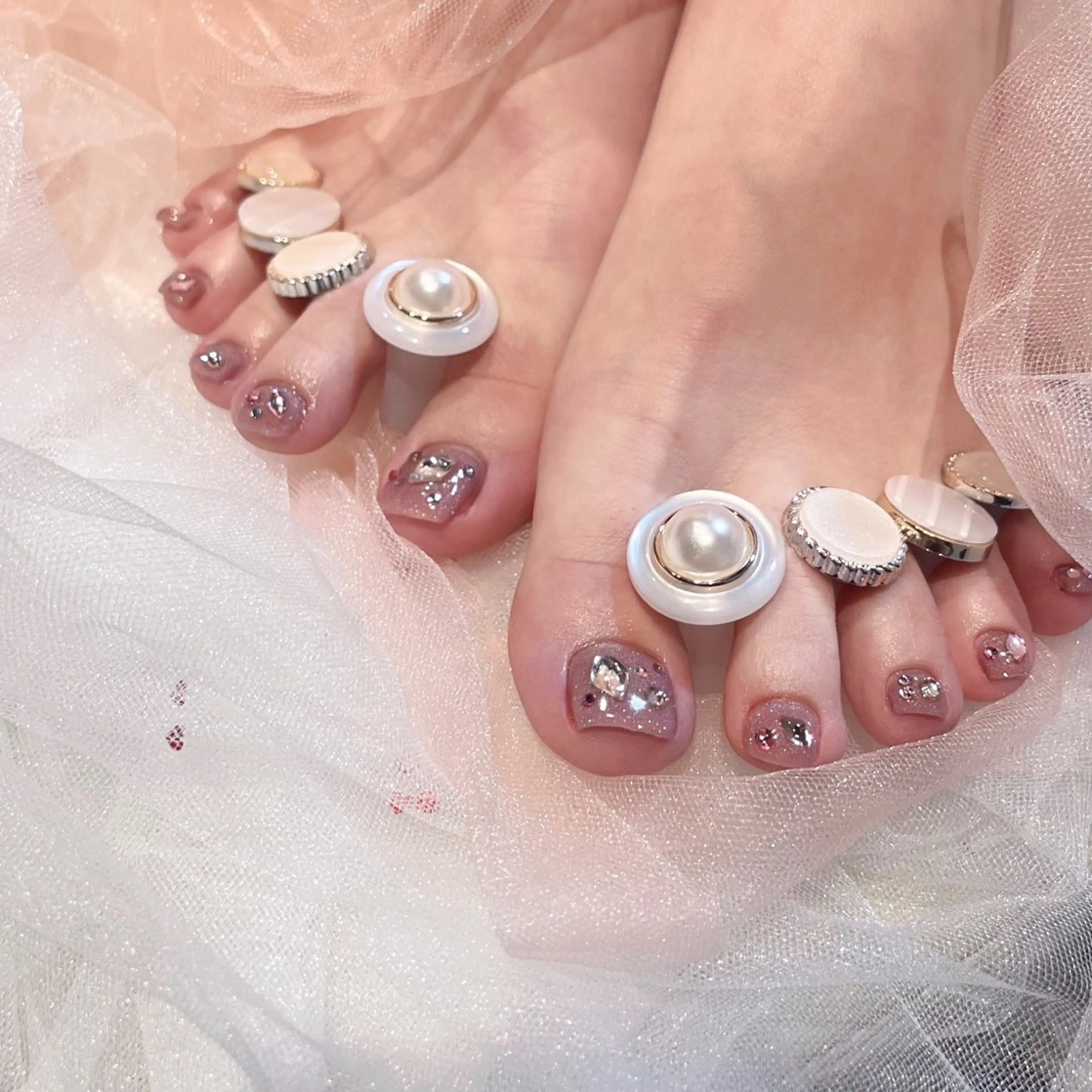 ネイル フットネイル キラキラネイル EMANON心斎橋店所属・大阪心斎橋ネイル/ hinataのネイルデザイン