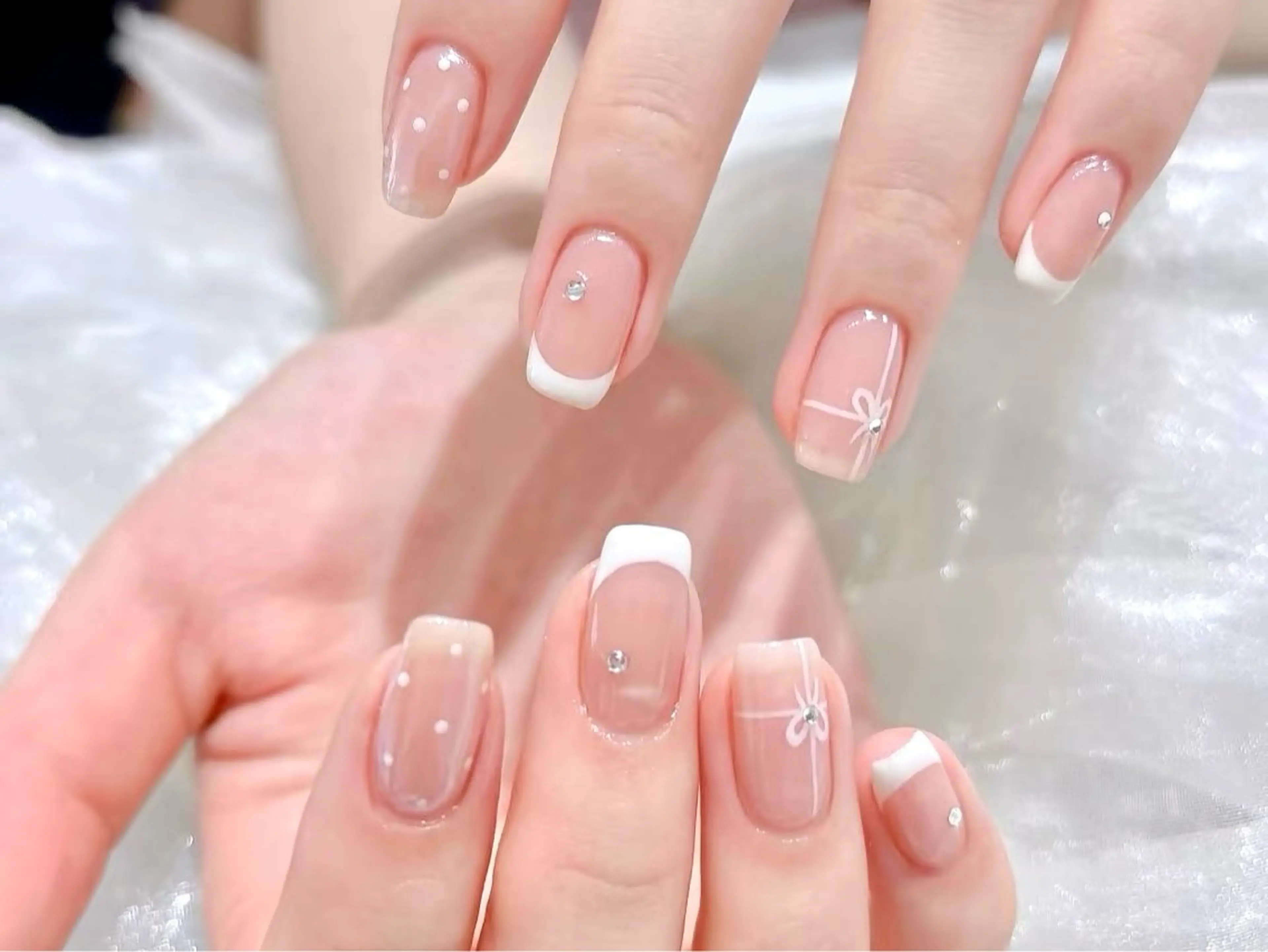 ネイル 長さ出し フットネイル フレンチネイル ジェルネイル ガーリー ハンドネイル NYネイルサロン　千葉中央店所属・NYネイルサロン 千葉中央店のネイルデザイン