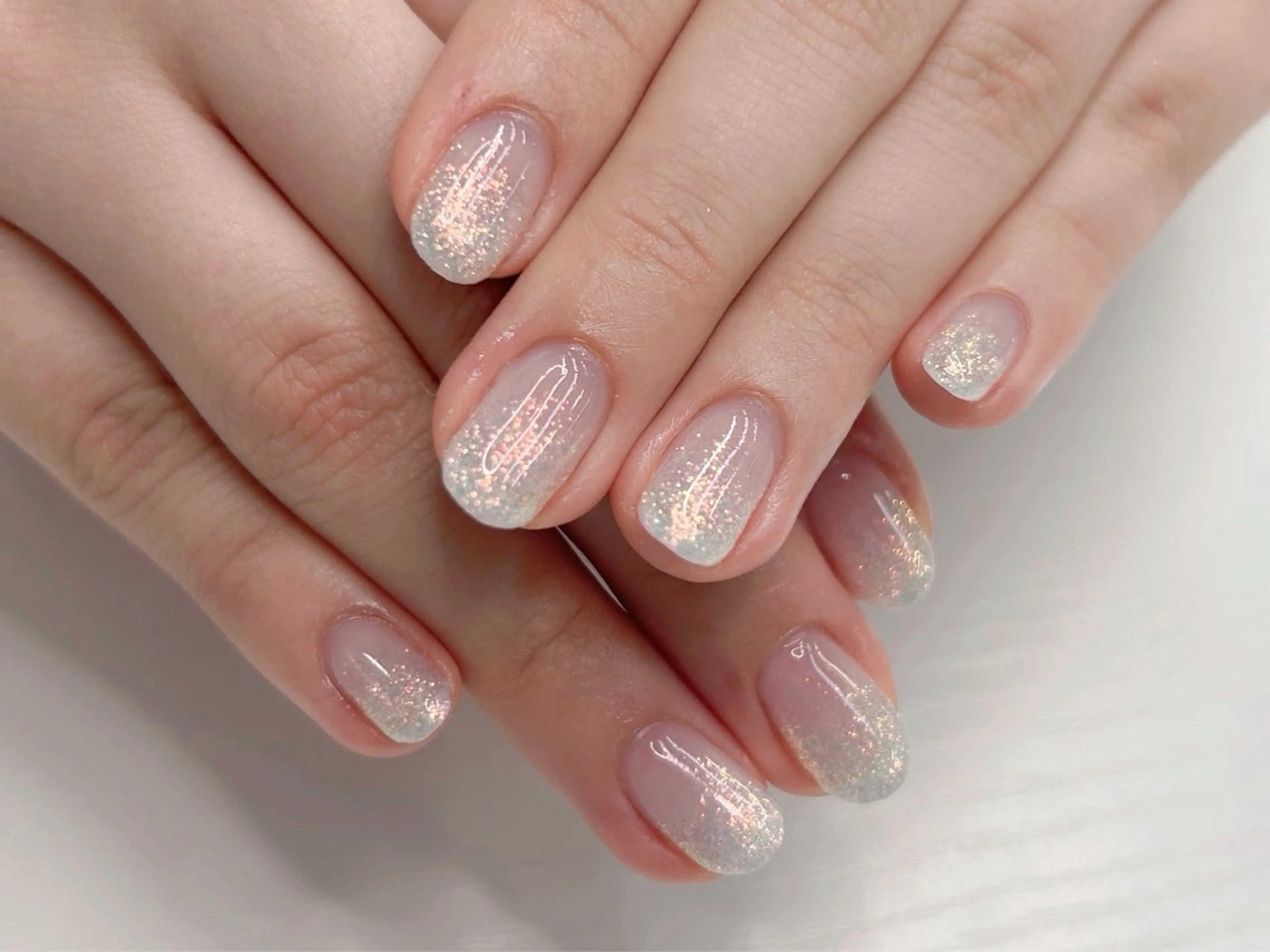 ネイル 桜ネイル グラデーション ラメ(グリッター) ラメグラデーション オフィスネイル ハンドネイル Forca total studio所属・Forca Airaのネイルデザイン