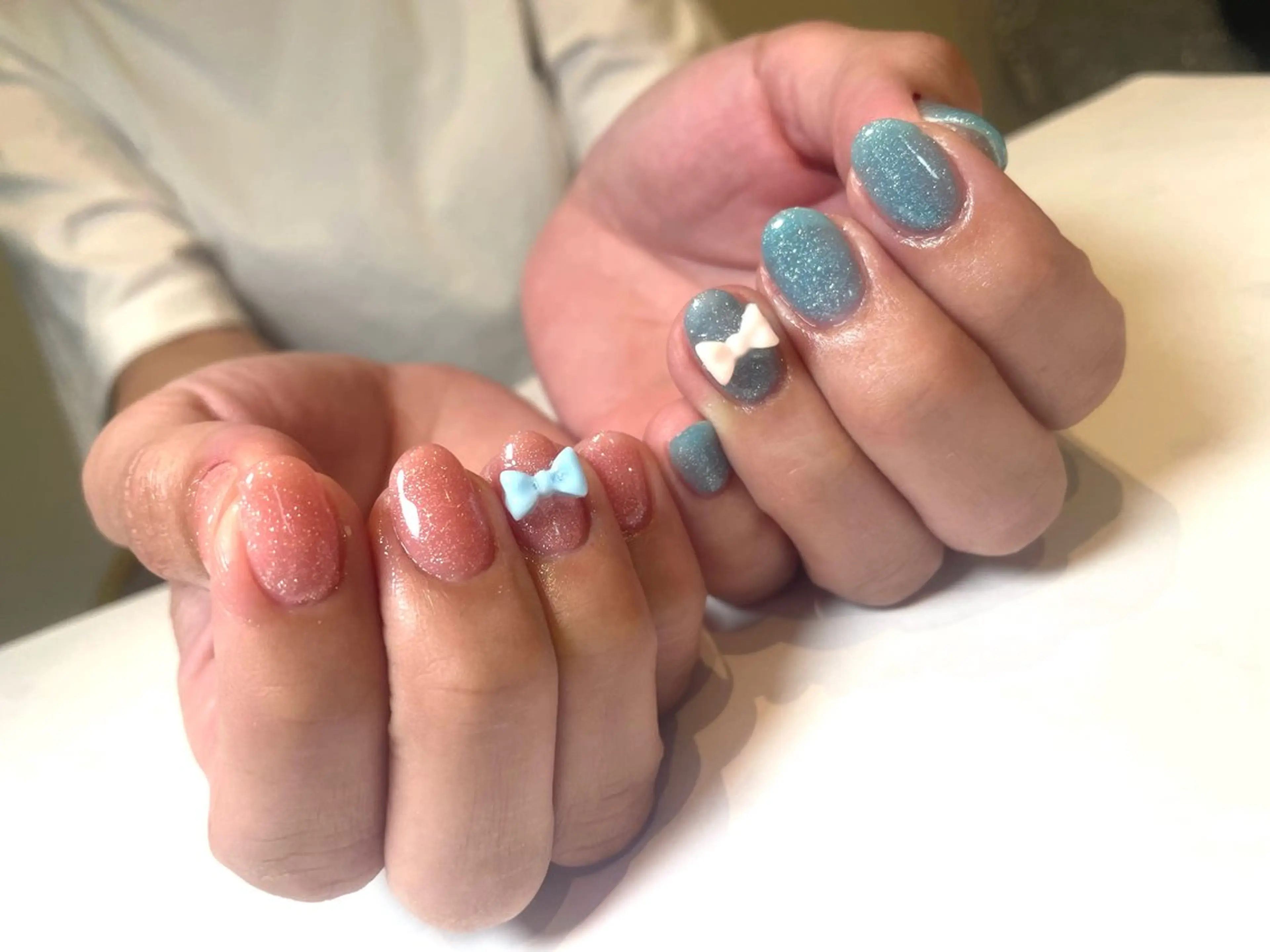 ピンクラメ🩷水色ラメ🩵おリボンパーツ🎀の写真