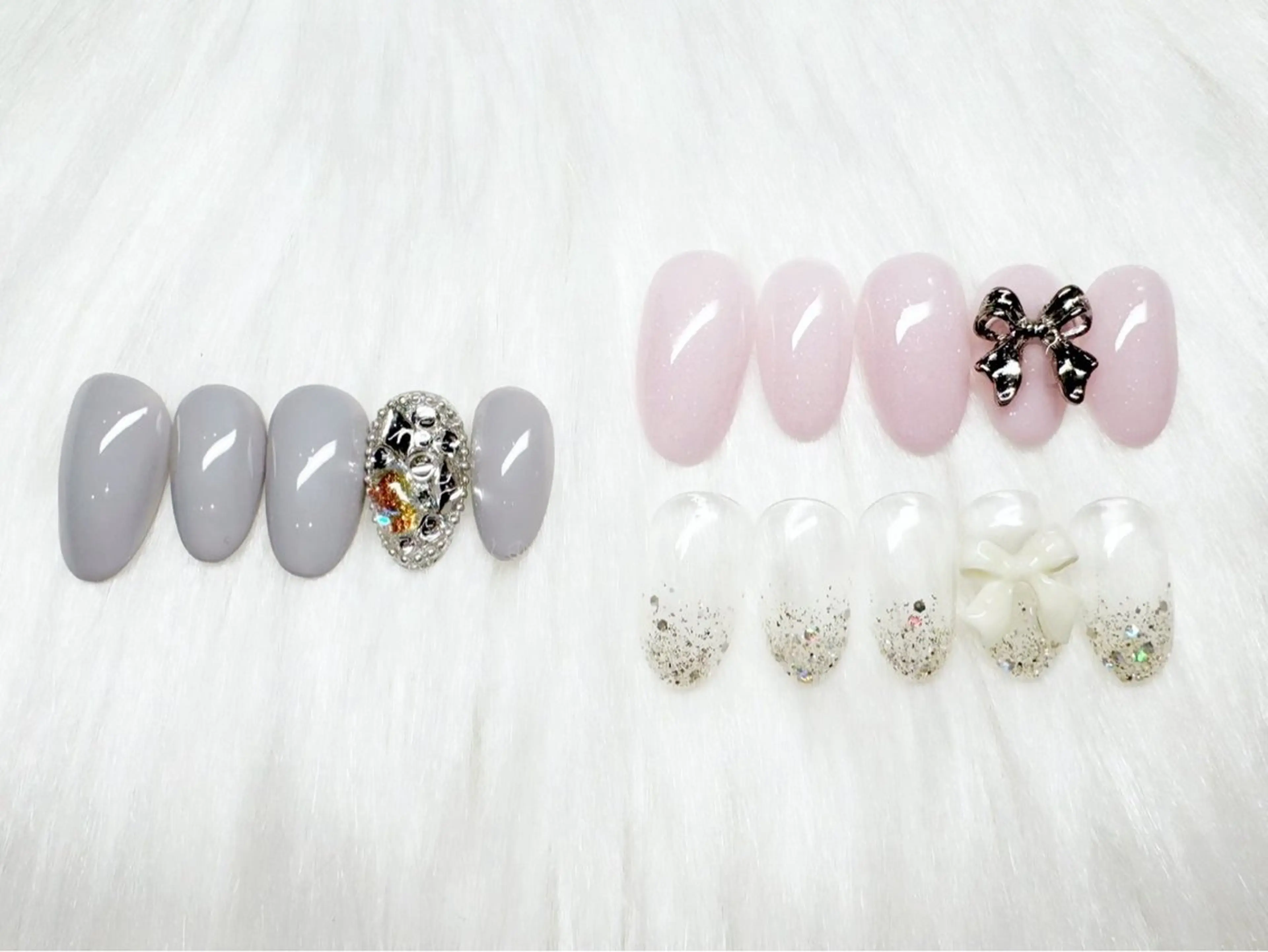 オフあり🎀リボンorビジュー埋めつくしネイルの写真