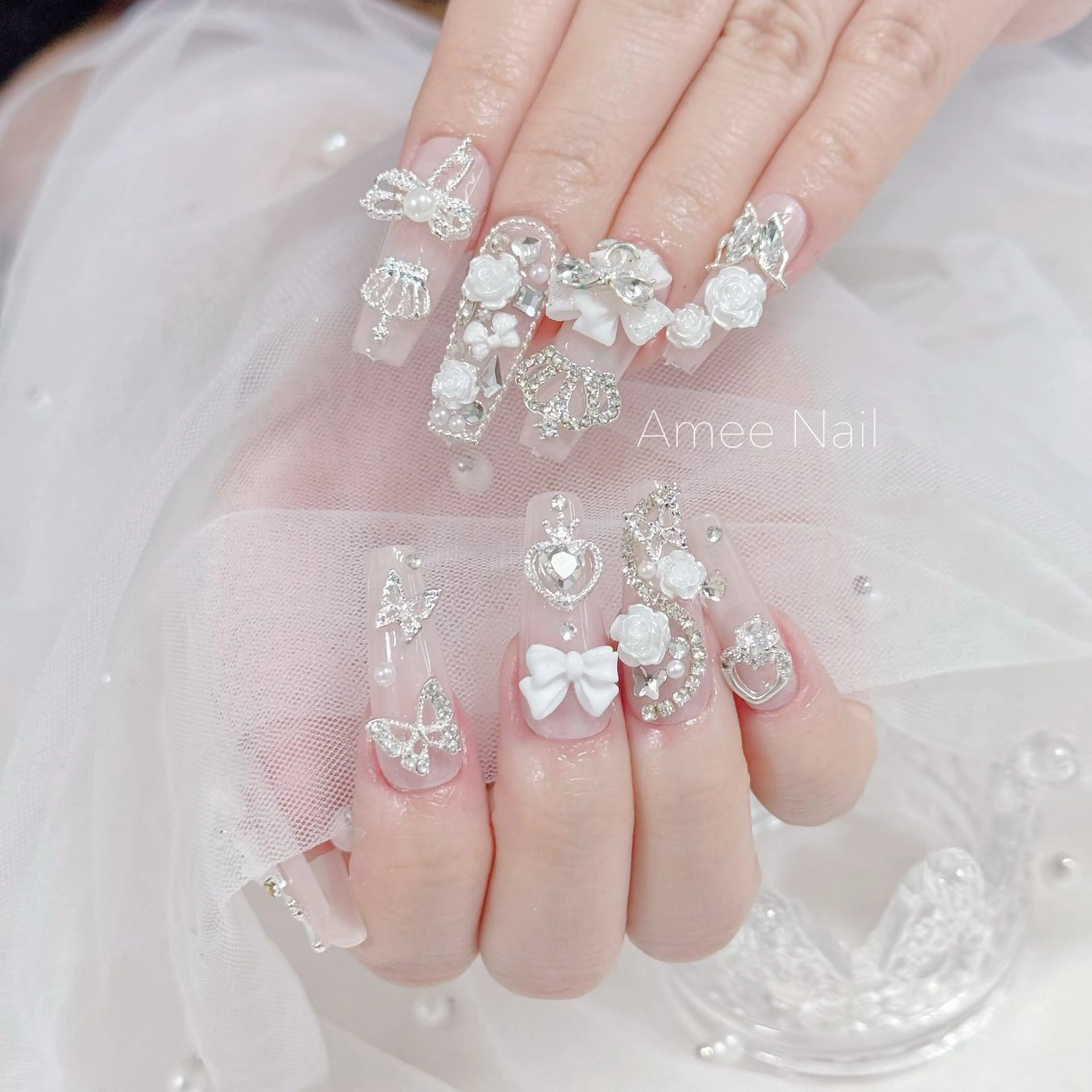 ネイル 成人式 ロングネイル マグネットネイル 大理石ネイル(マーブル) リボン ハンドネイル Amee Nailsalonのネイルデザイン