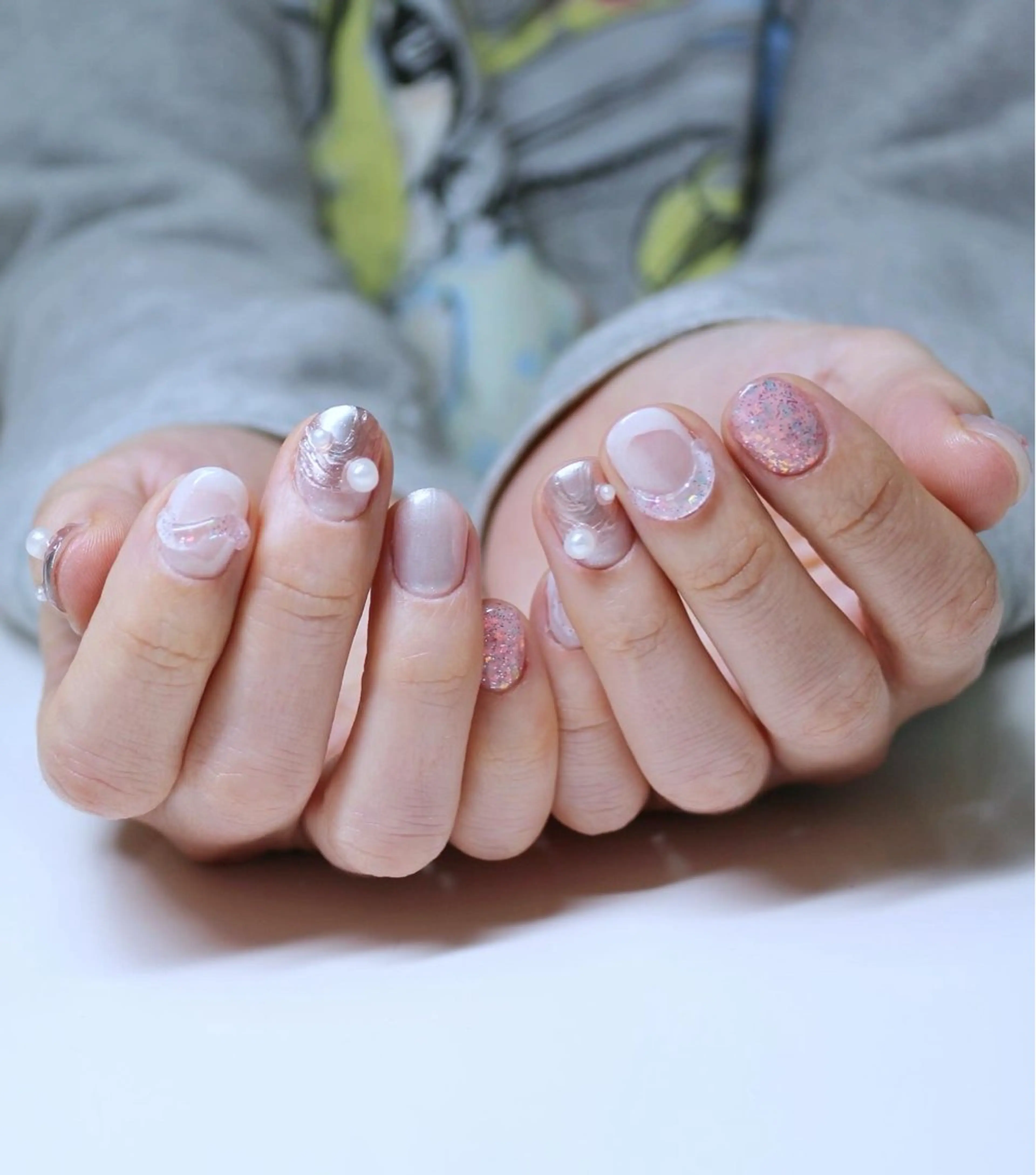 ネイル 桜ネイル キラキラネイル ニュアンスネイル ピンク リボン ハンドネイル Baku Nailsのネイルデザイン