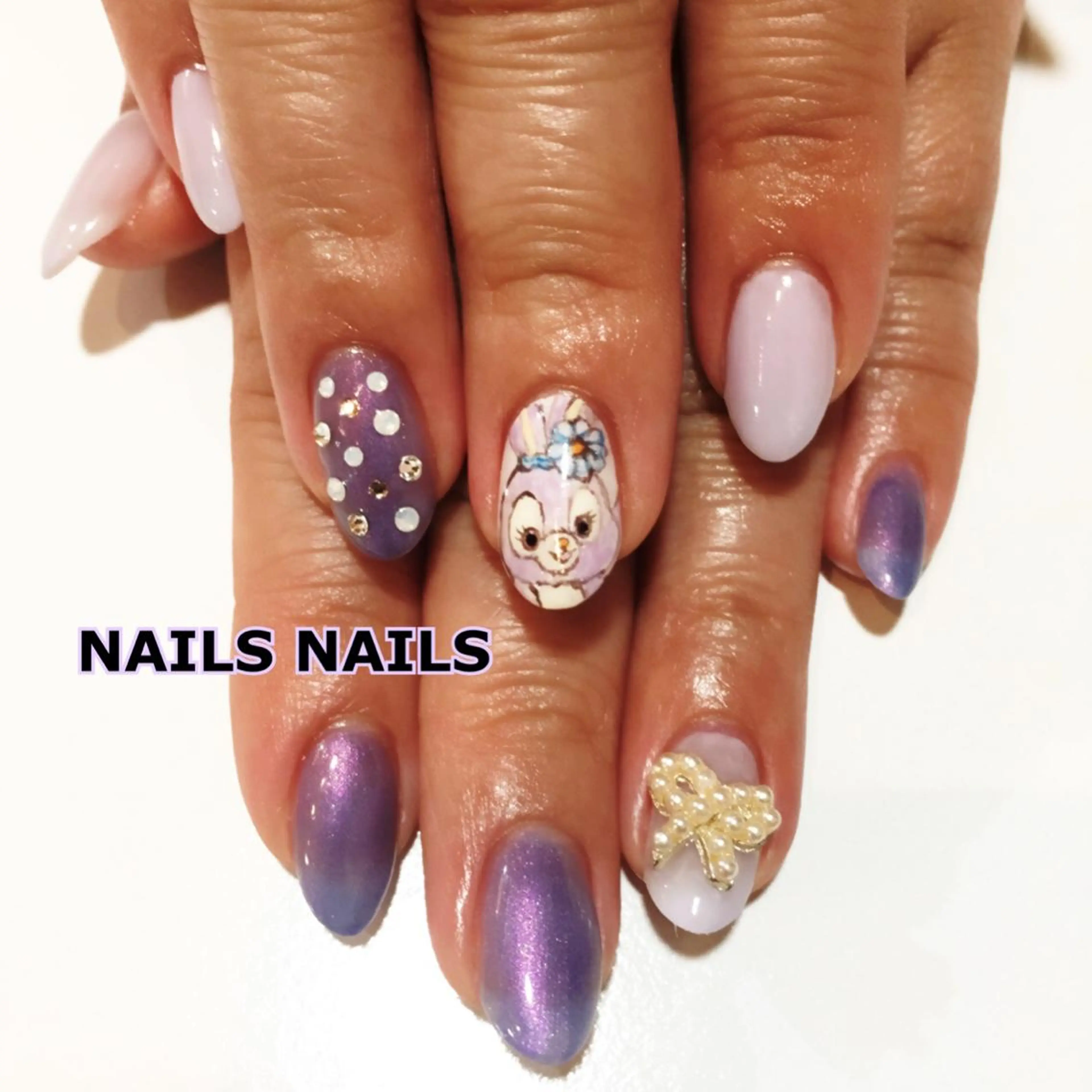 ネイル ジェルネイル パープル リボン NAILSNAILS ERIKAのネイルデザイン