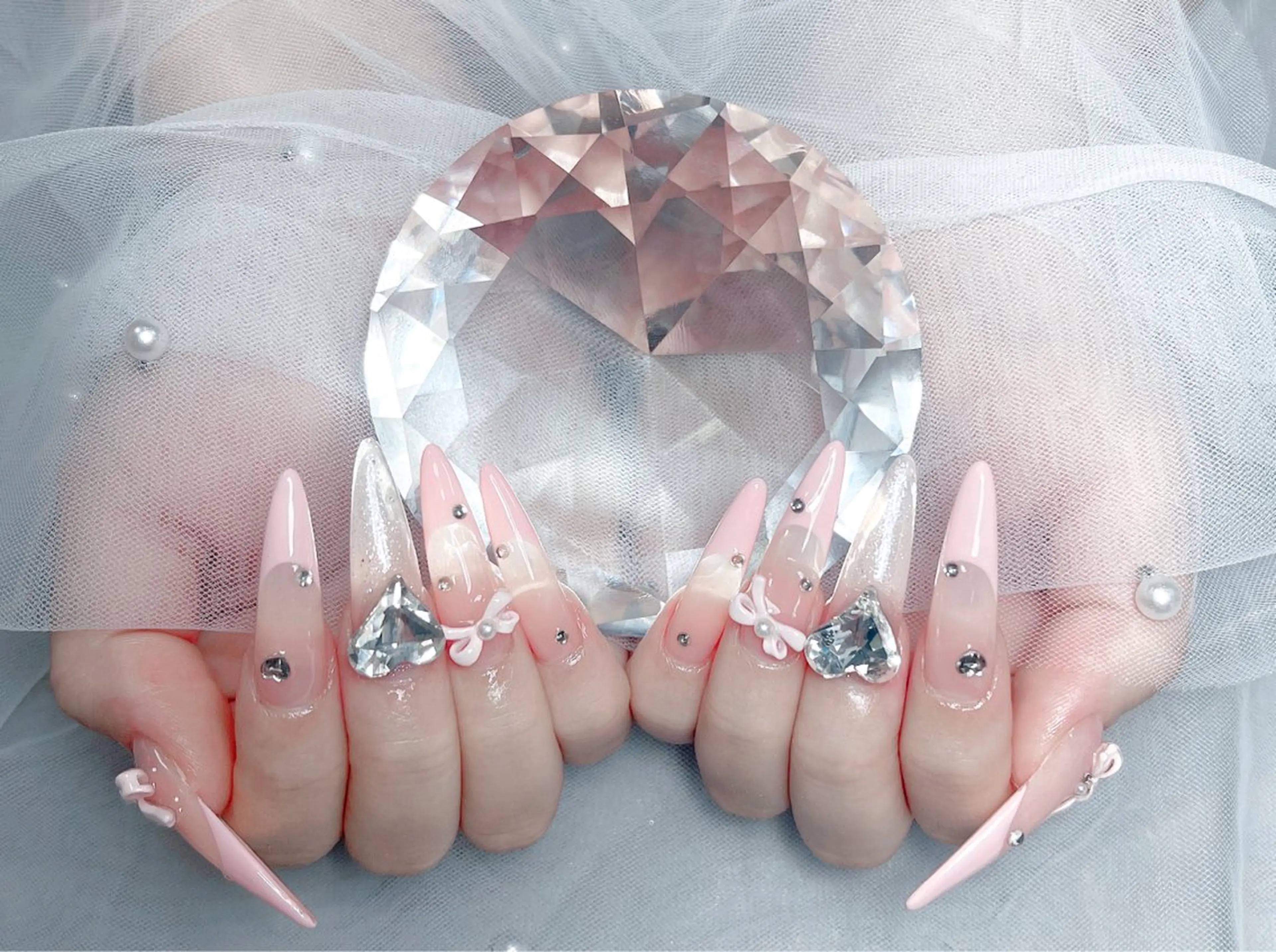 ネイル 成人式 ロングネイル マグネットネイル 大理石ネイル(マーブル) リボン ハンドネイル Amee Nailsalonのネイルデザイン