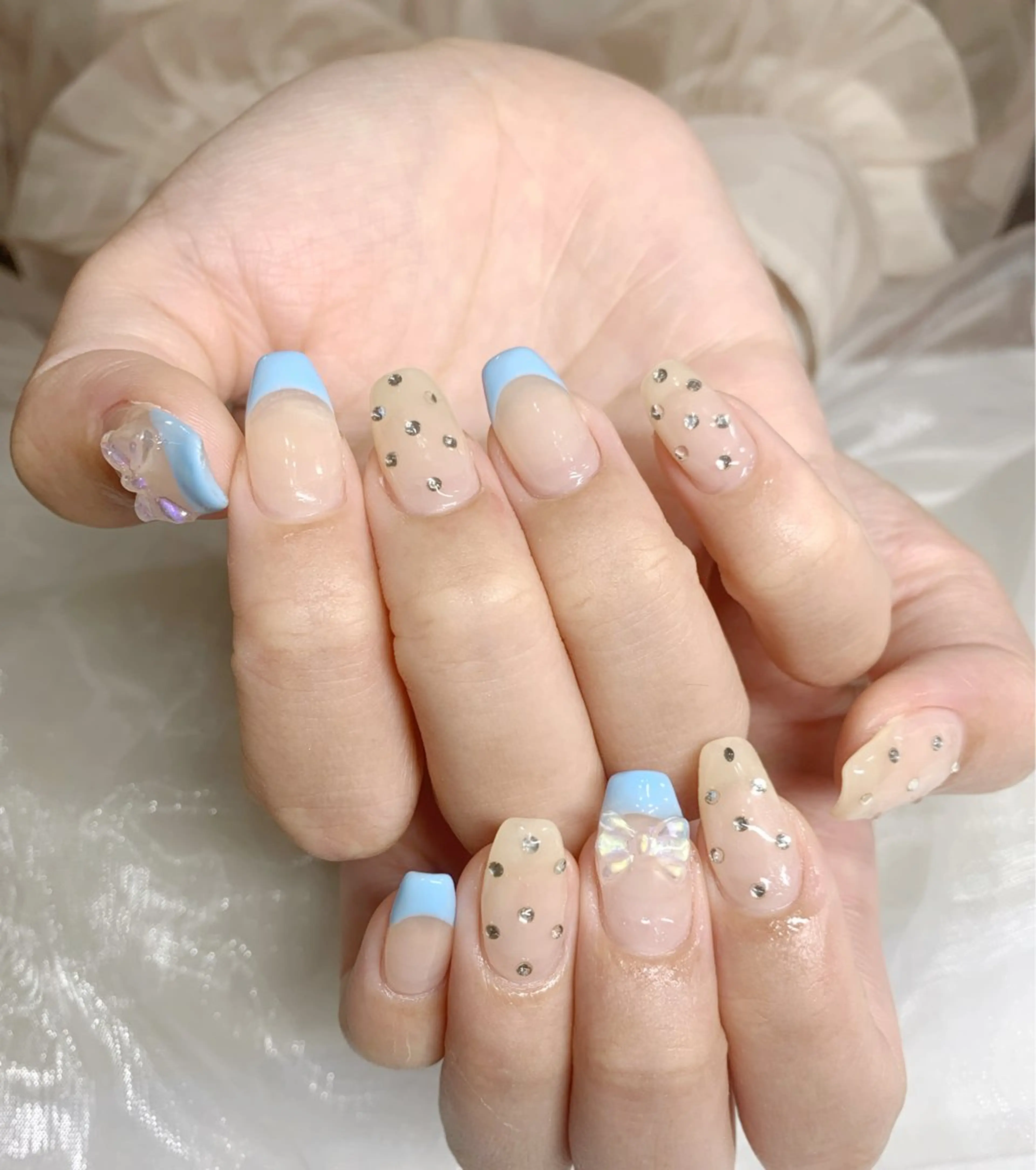 ネイル フレンチネイル リボン 春ネイル 夏ネイル ハンドネイル mira-cle大濱美容アカデミー所属・AI NAのネイルデザイン