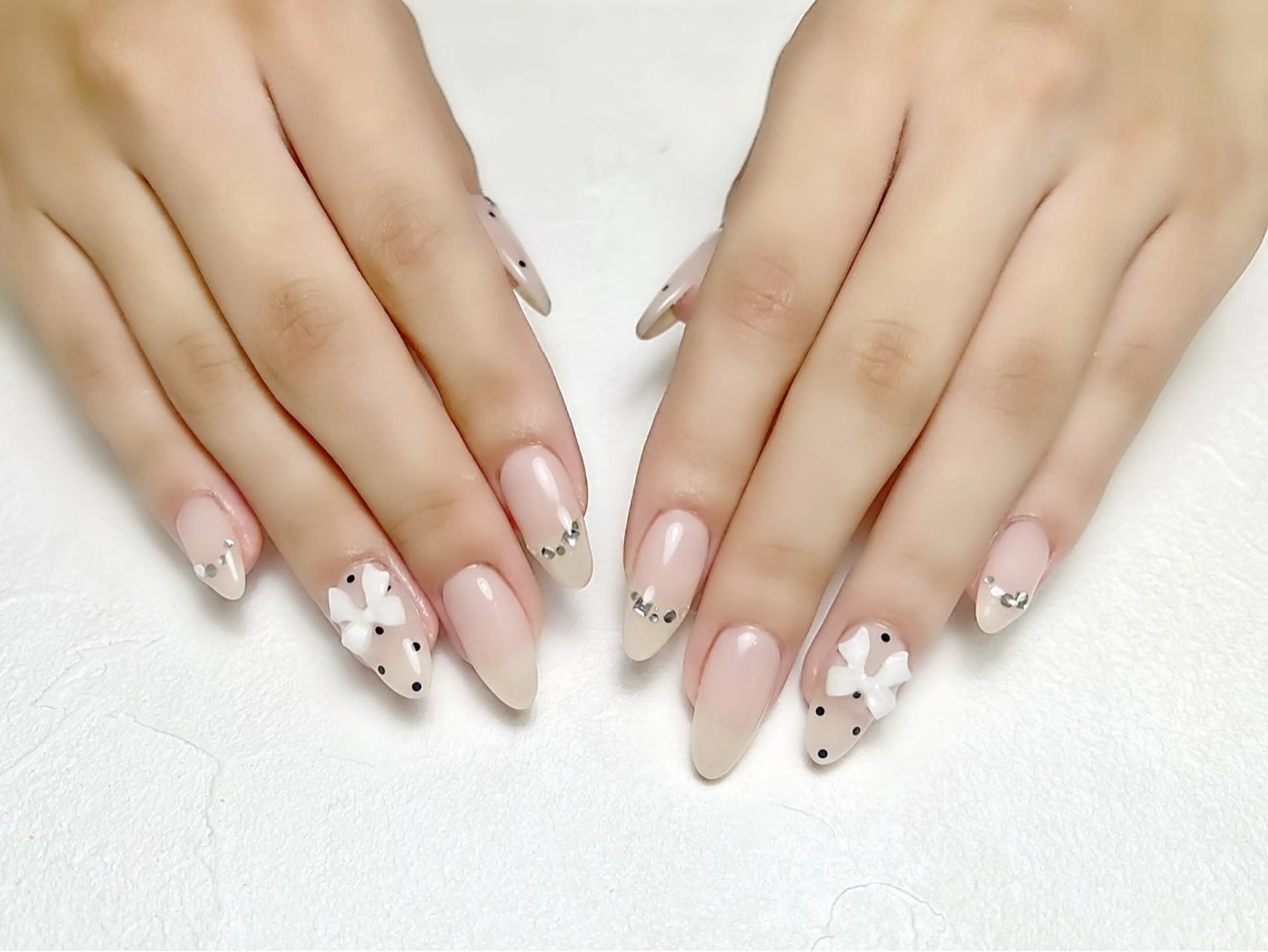 ネイル ドット ガーリー ピンク リボン rouse nail RISATOのネイルデザイン