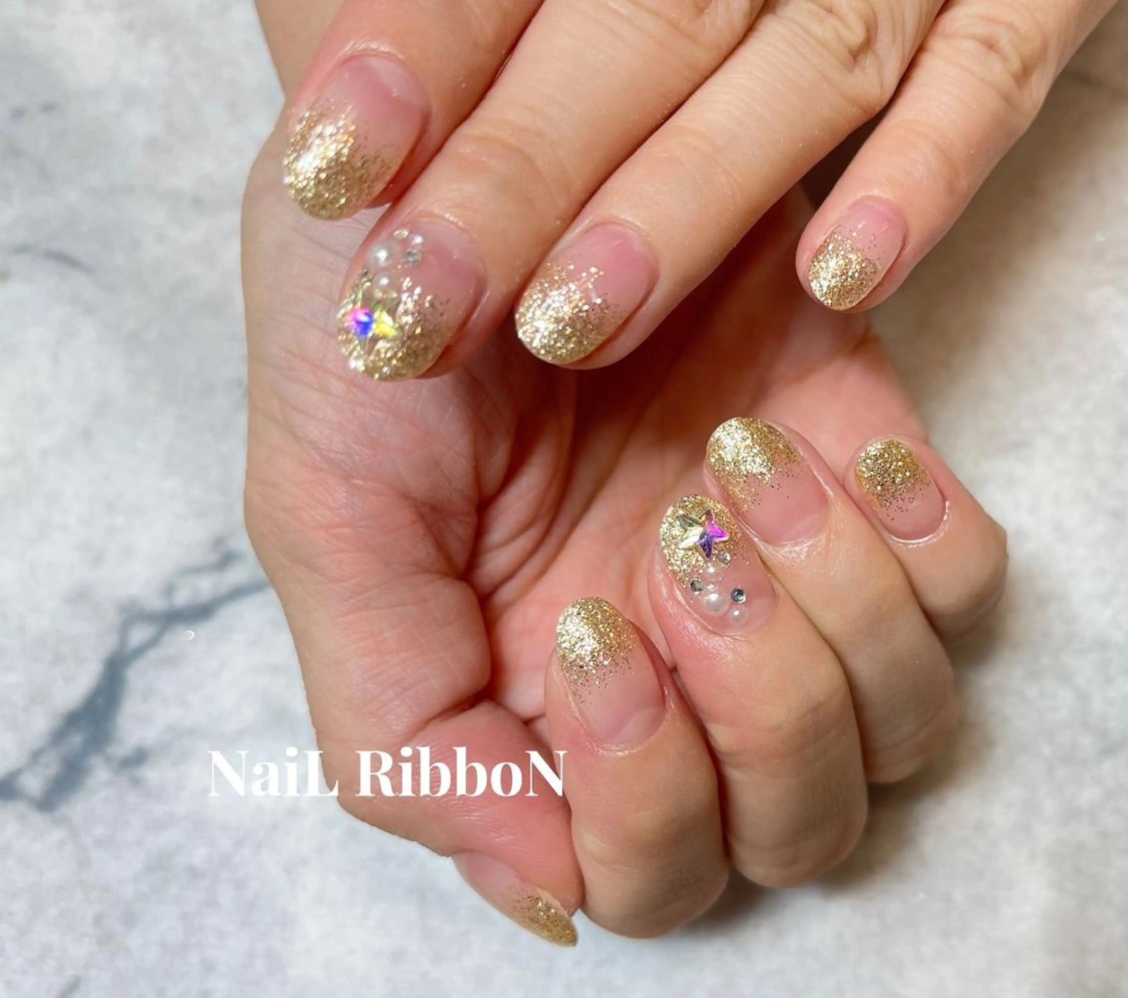 ネイル ネイルリボン 受付スタッフのネイルデザイン