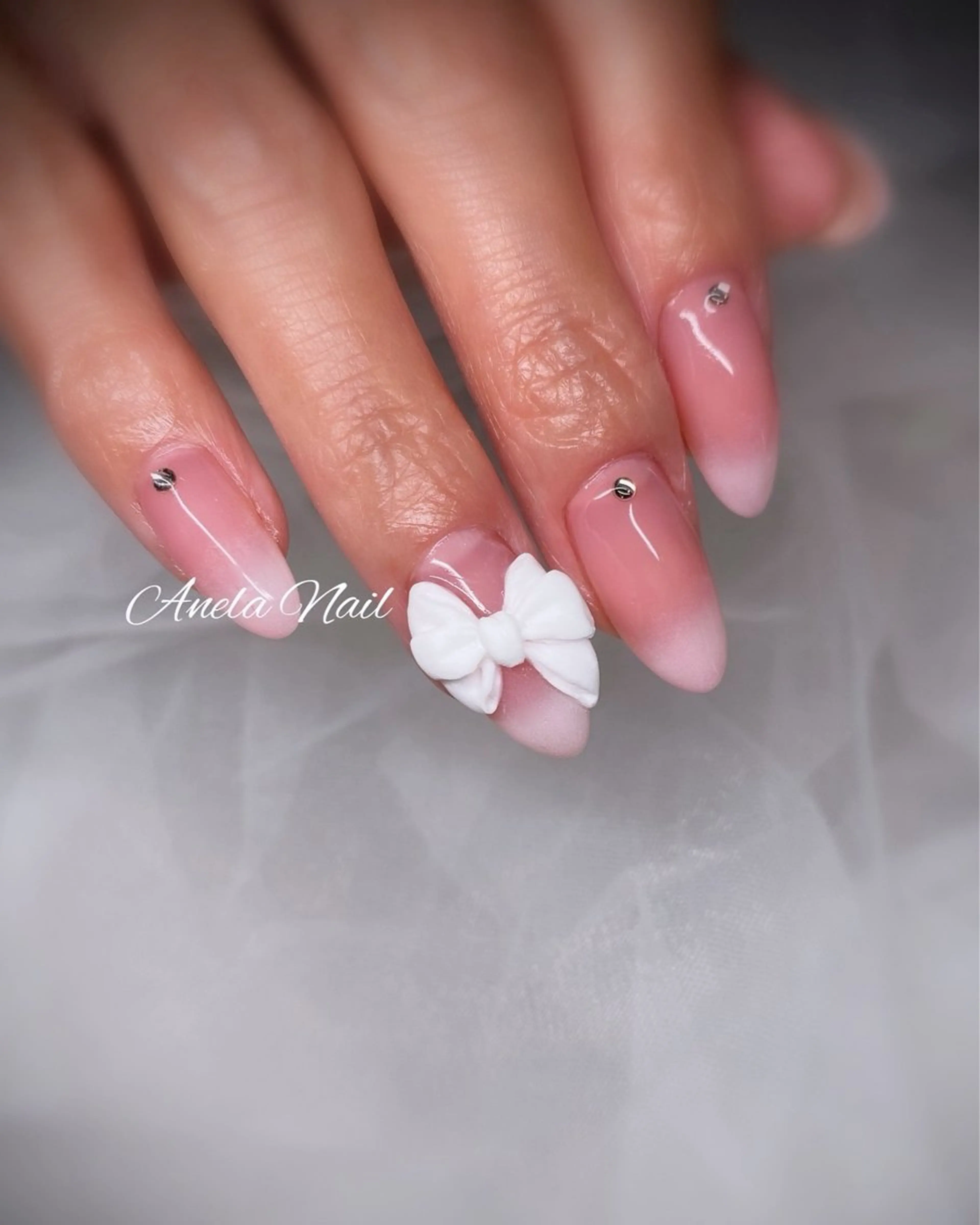 ネイル アートネイル リボン Anela Nailのネイルデザイン