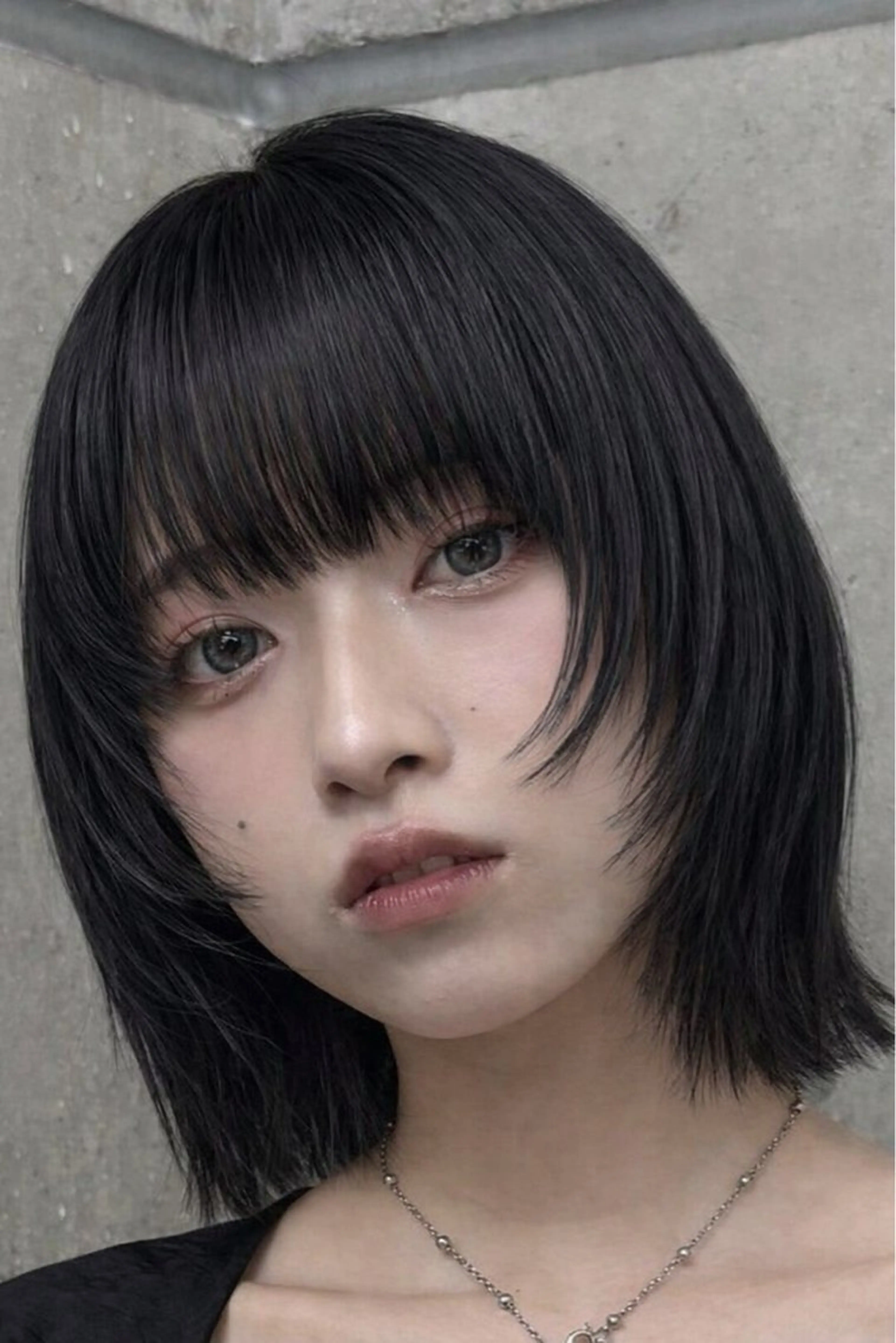 顔周り レイヤーボブ 外ハネの写真