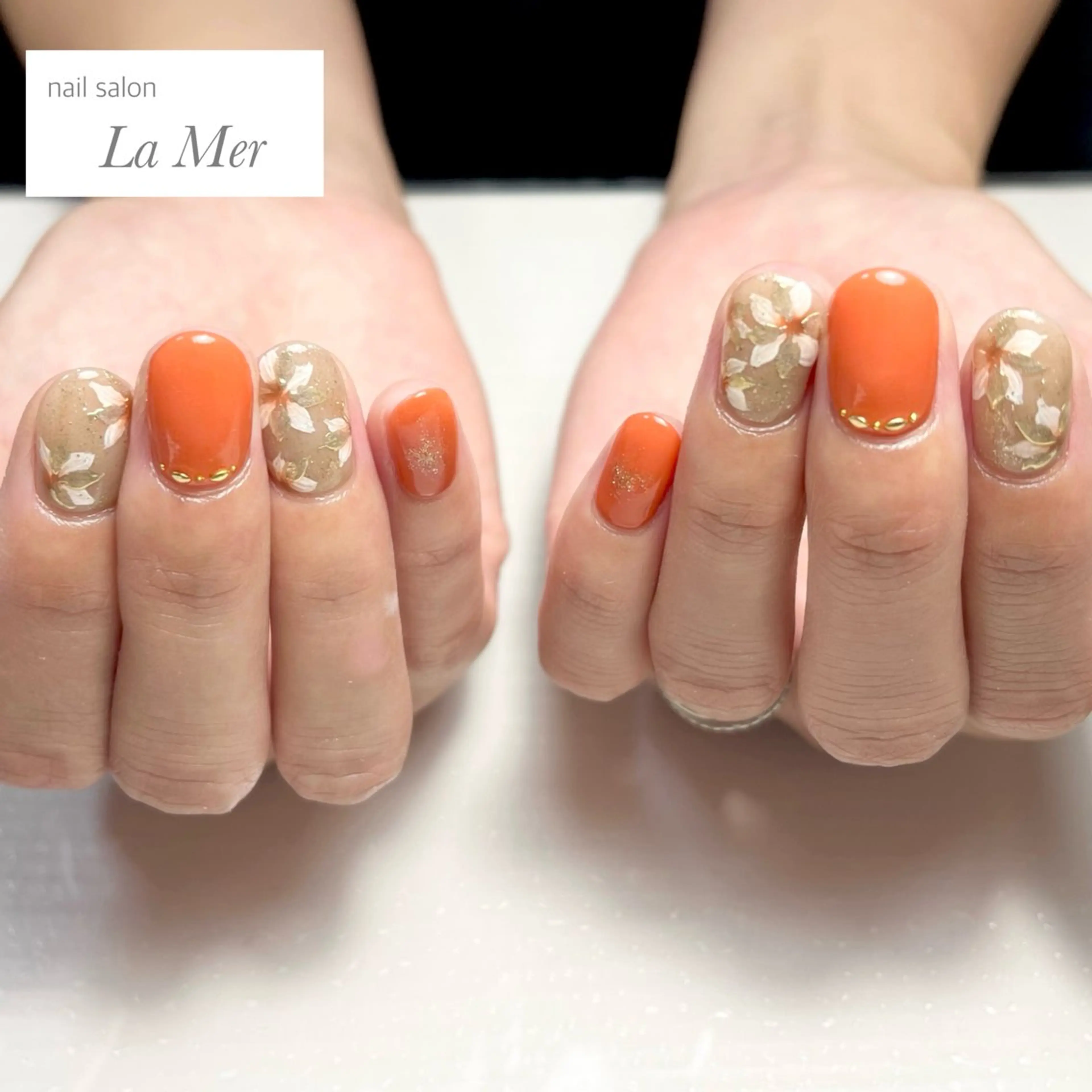 ネイル アートネイル フラワーネイル ミラーネイル オレンジ 夏ネイル ハンドネイル nailsalon La Merのネイルデザイン