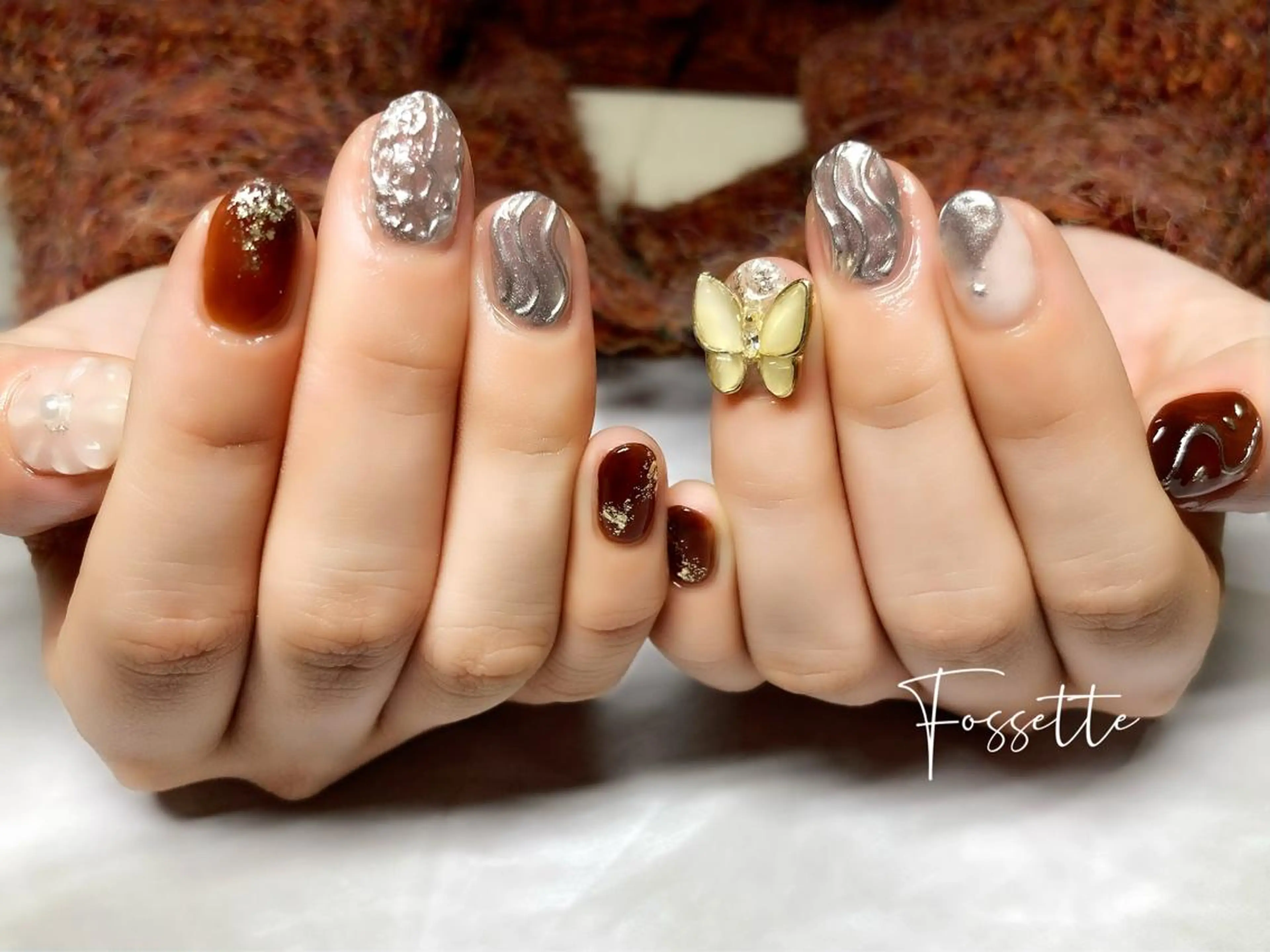 ネイル ブラウン 成人式 フラワーネイル ミラーネイル ニュアンスネイル nailsalon Fossetteのネイルデザイン