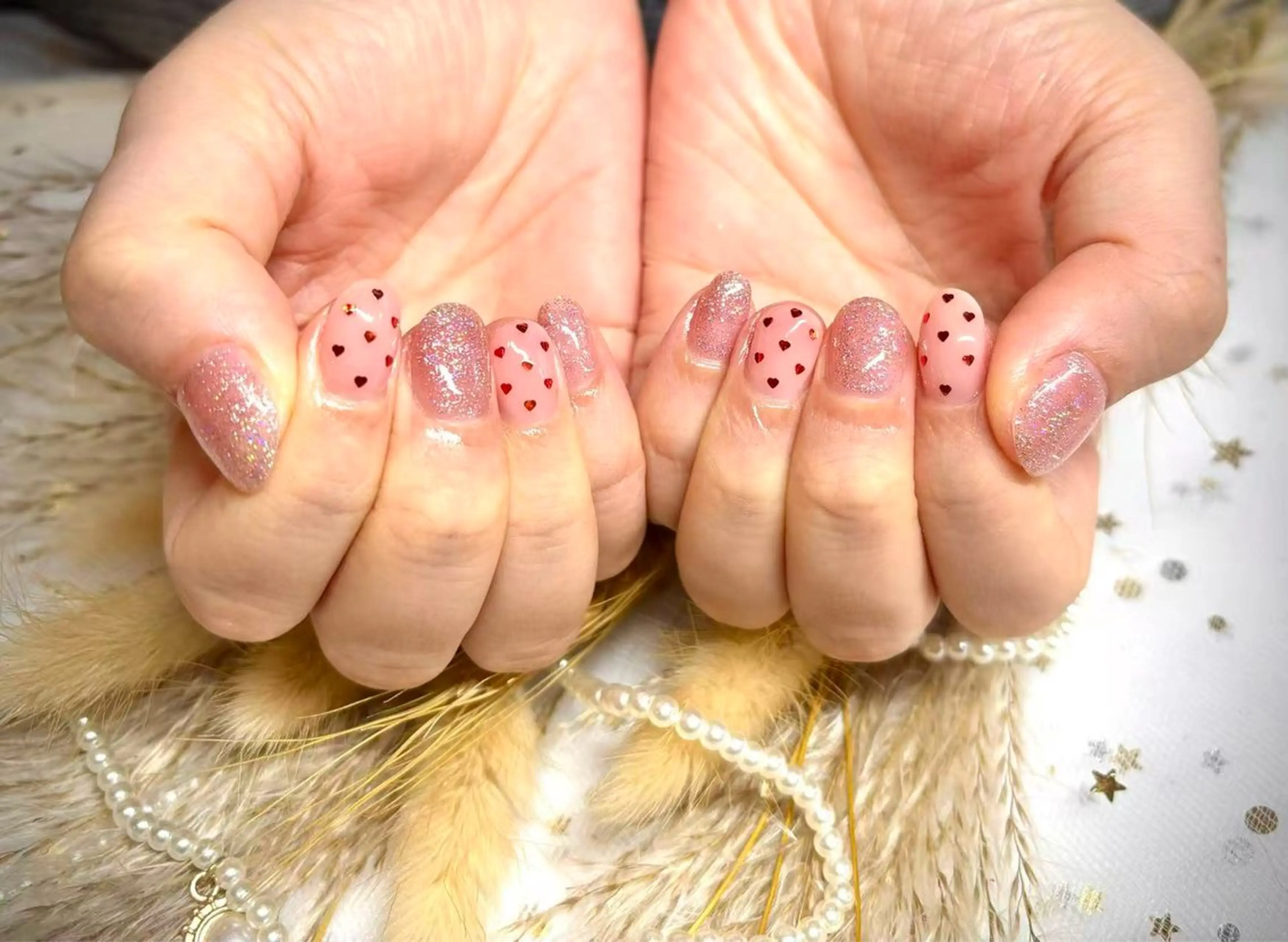 ネイル ハート キラキラネイル ウィ べイサンのネイルデザイン