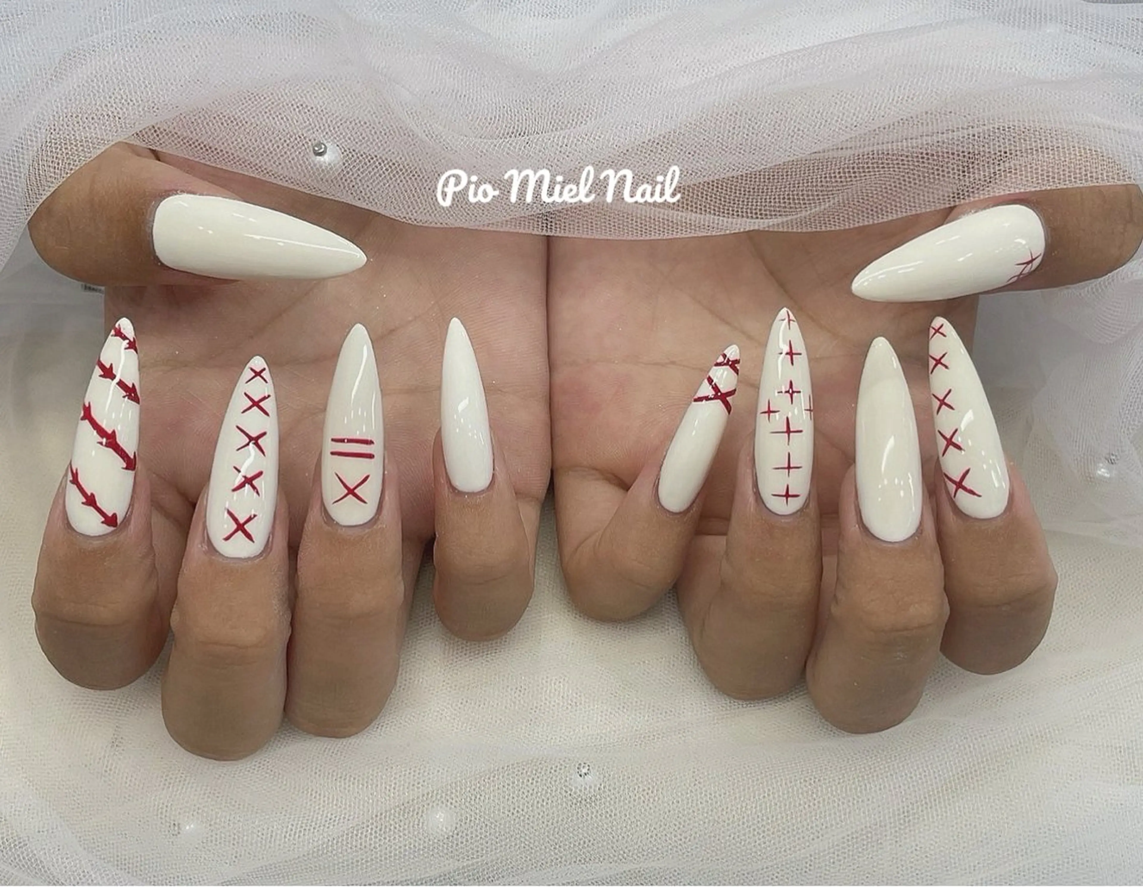 ロング ハンドネイル Pio Mielのネイルデザイン