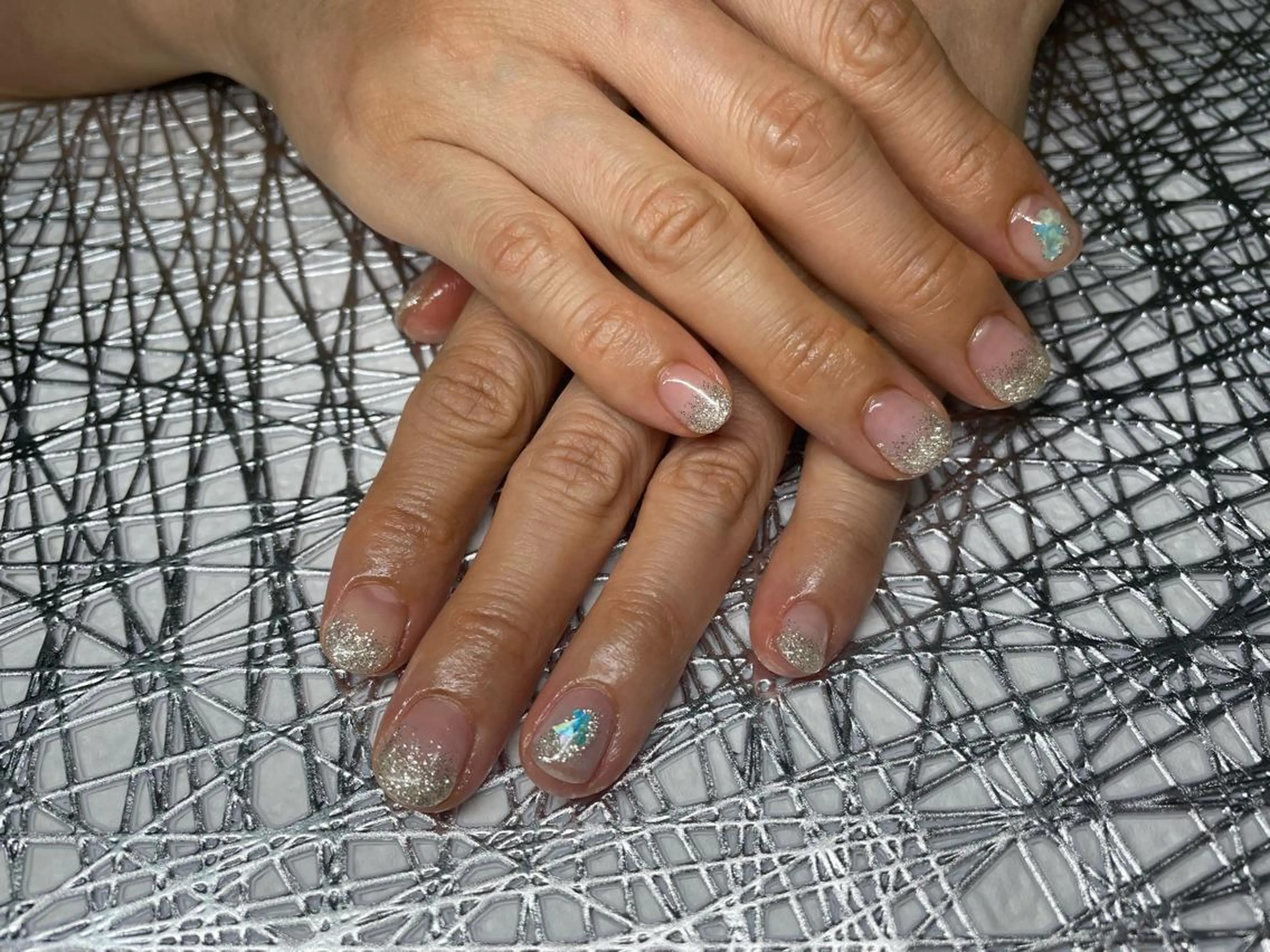 ネイル クリアネイル グラデーション キラキラネイル ラメ(グリッター) ハンドネイル ハンドケア petillant所属・nail salon petillantのネイルデザイン