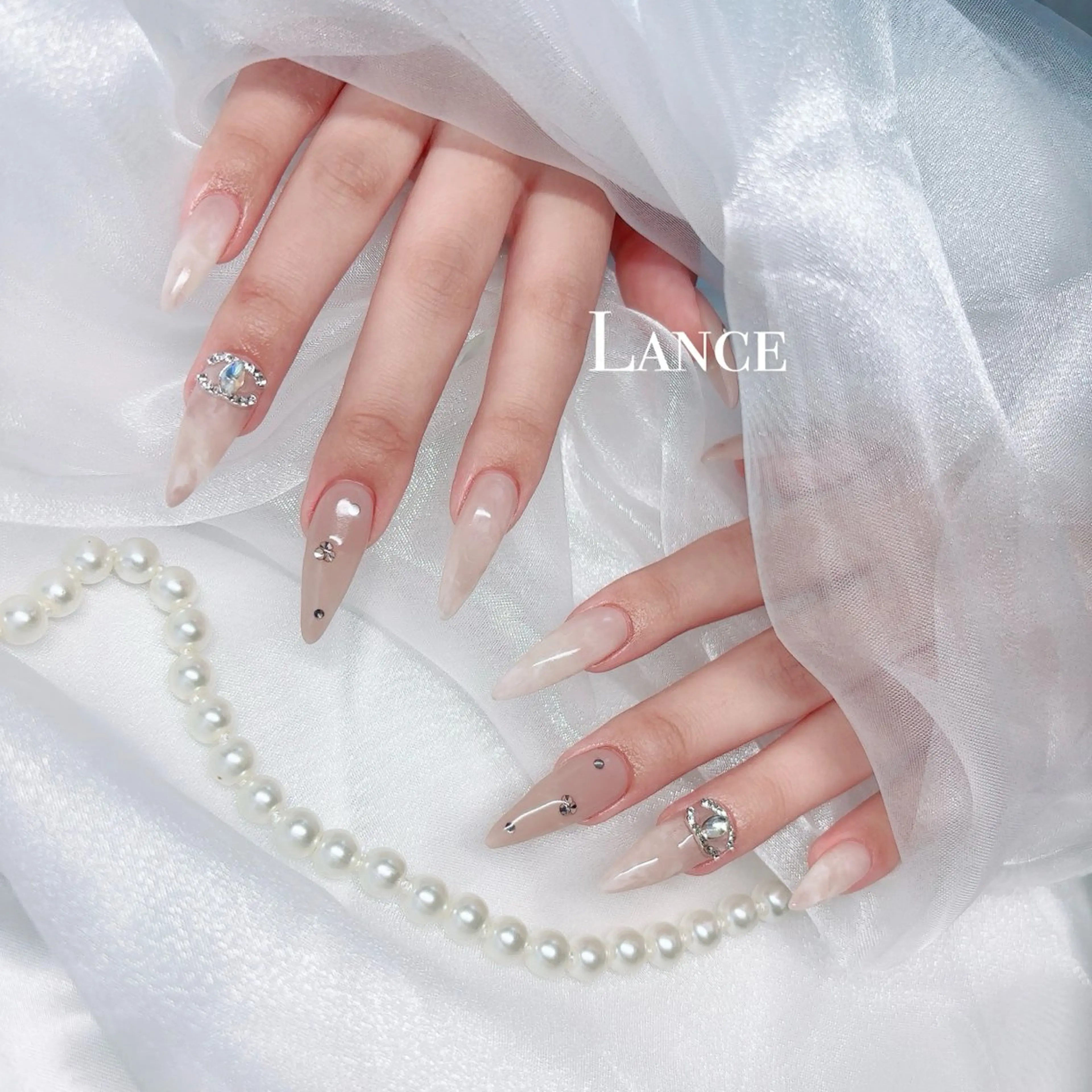 ネイル キラキラネイル 韓国ネイル 春ネイル ワンホンネイル ハンドネイル Lance nailのネイルデザイン
