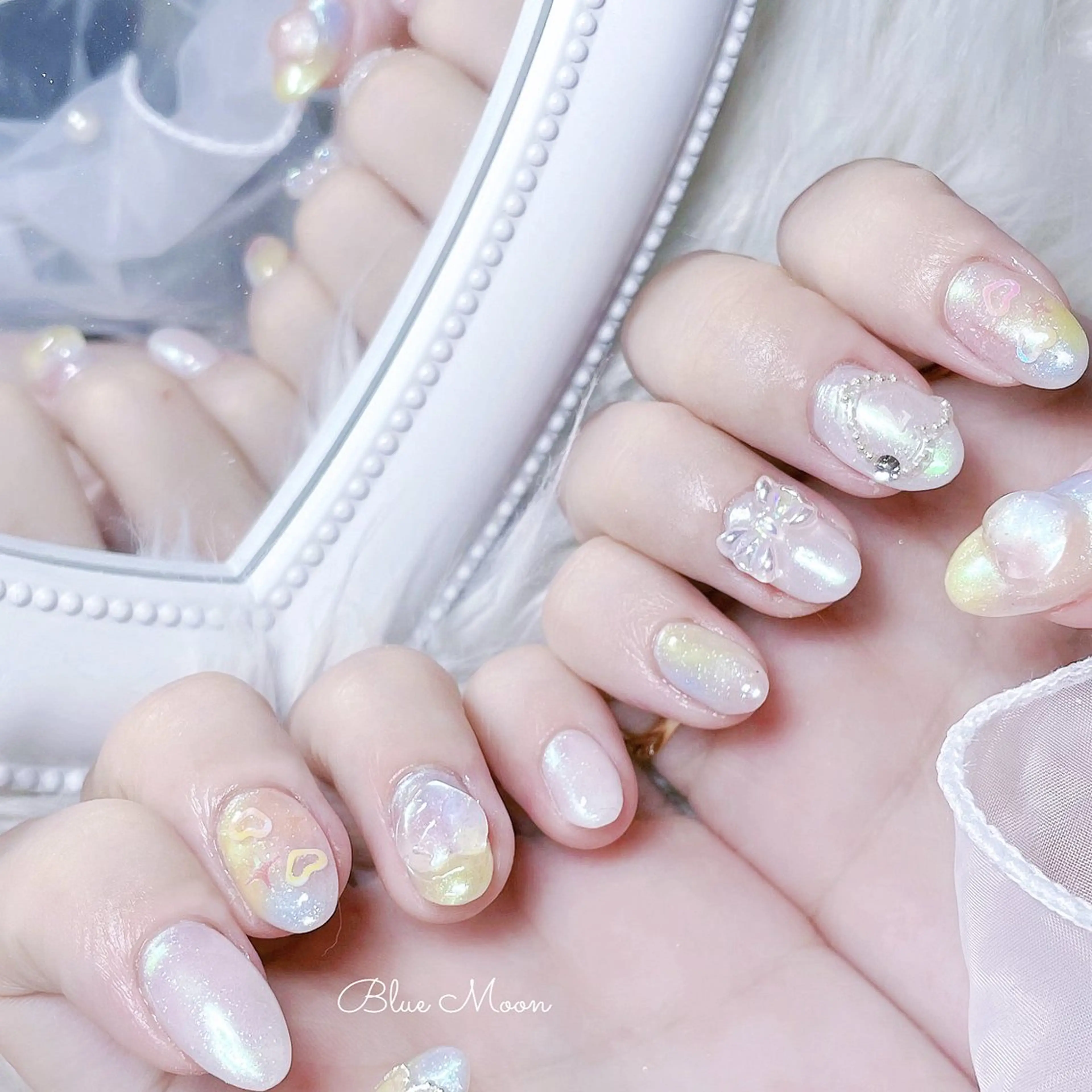 ネイル ハート ミラーネイル リボン ハンドネイル フットネイル ハンドケア nail salon Blue Moonのネイルデザイン