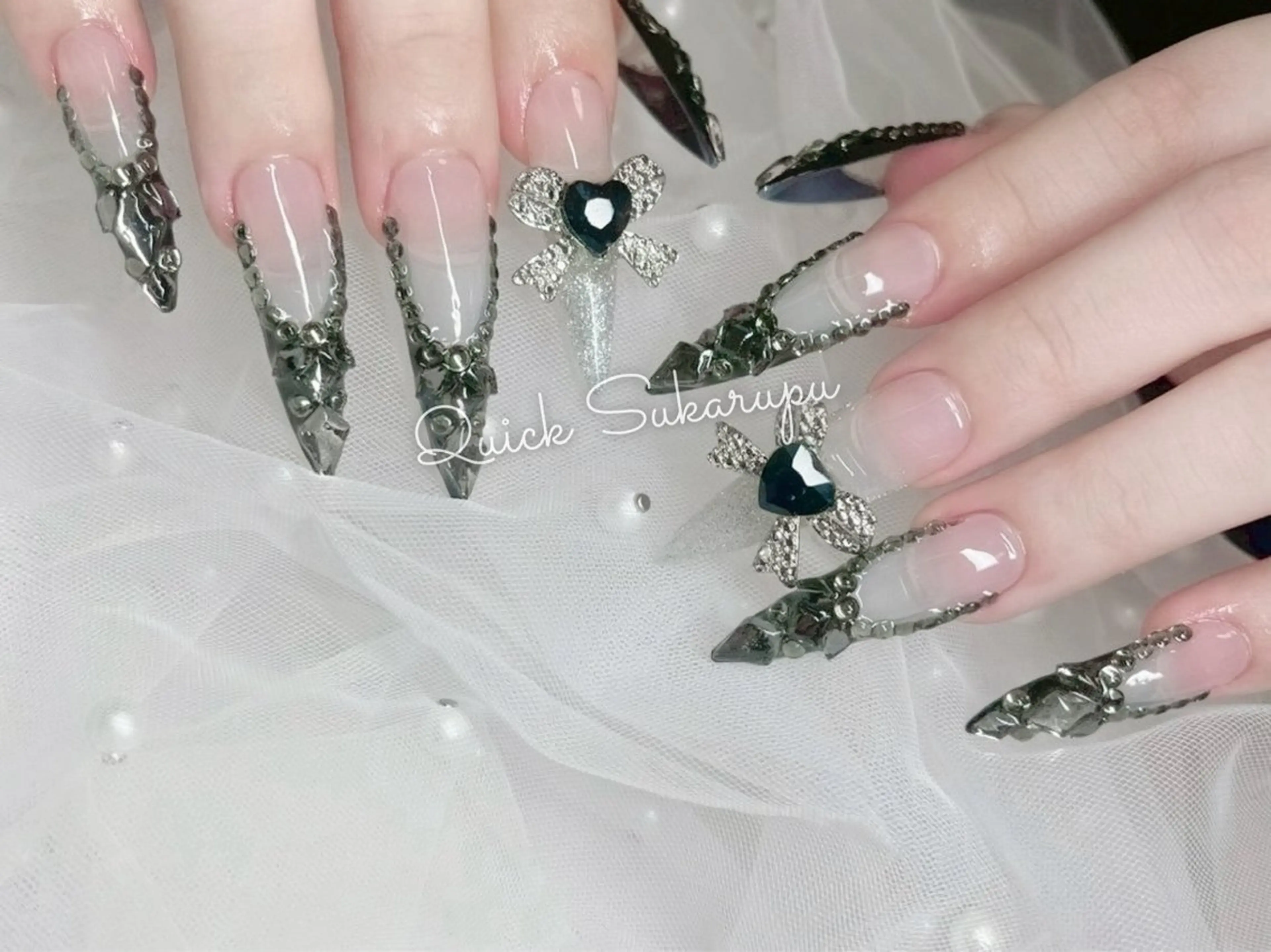 ロング ハンドネイル Quick Sukarupu 高田馬場店所属・Quick Sukarupuのネイルデザイン