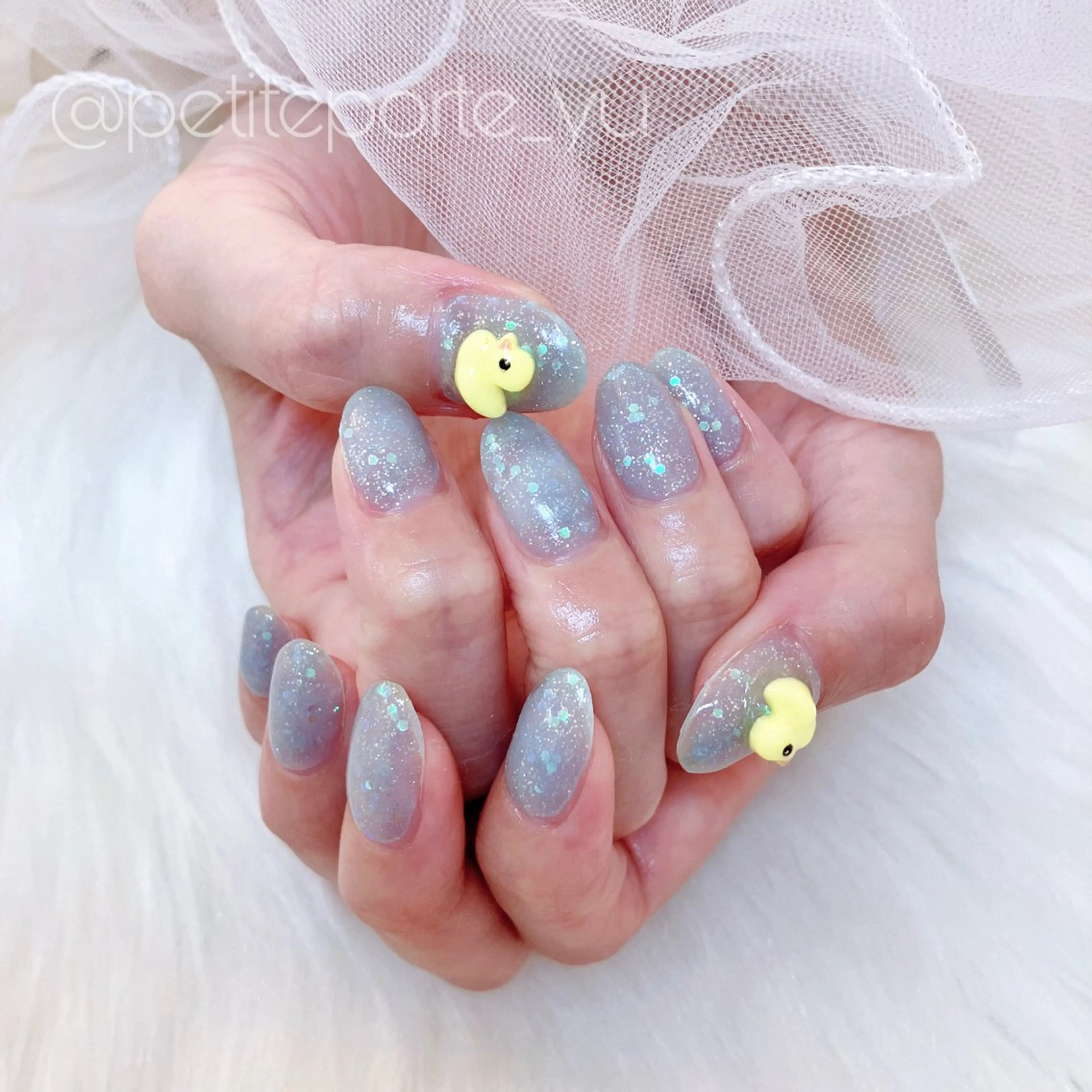 ネイル ジェルネイル キラキラネイル ラメ(グリッター) 水色 ワンカラーネイル ハンドネイル nailsalon petite porte所属・petite porteのネイルデザイン