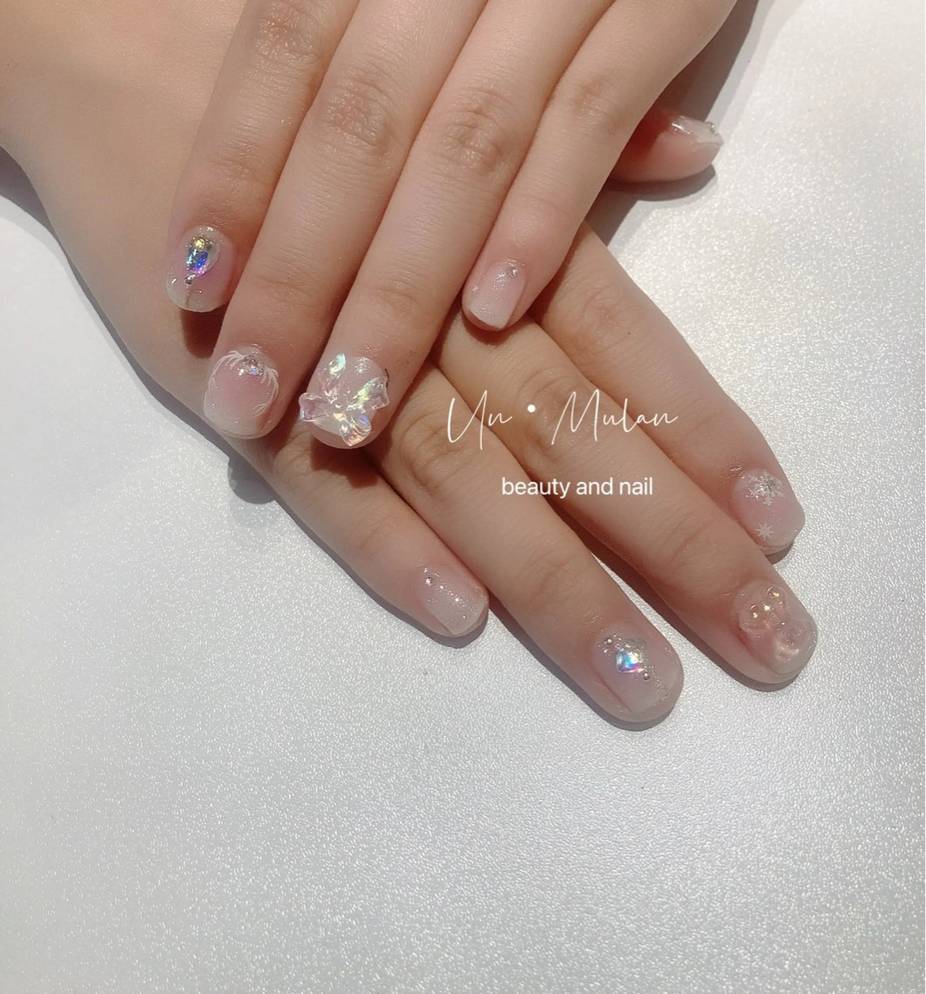 ネイル キラキラネイル リボン UN・MULAN (大田　瑶子)のエステ・リラクイメージ